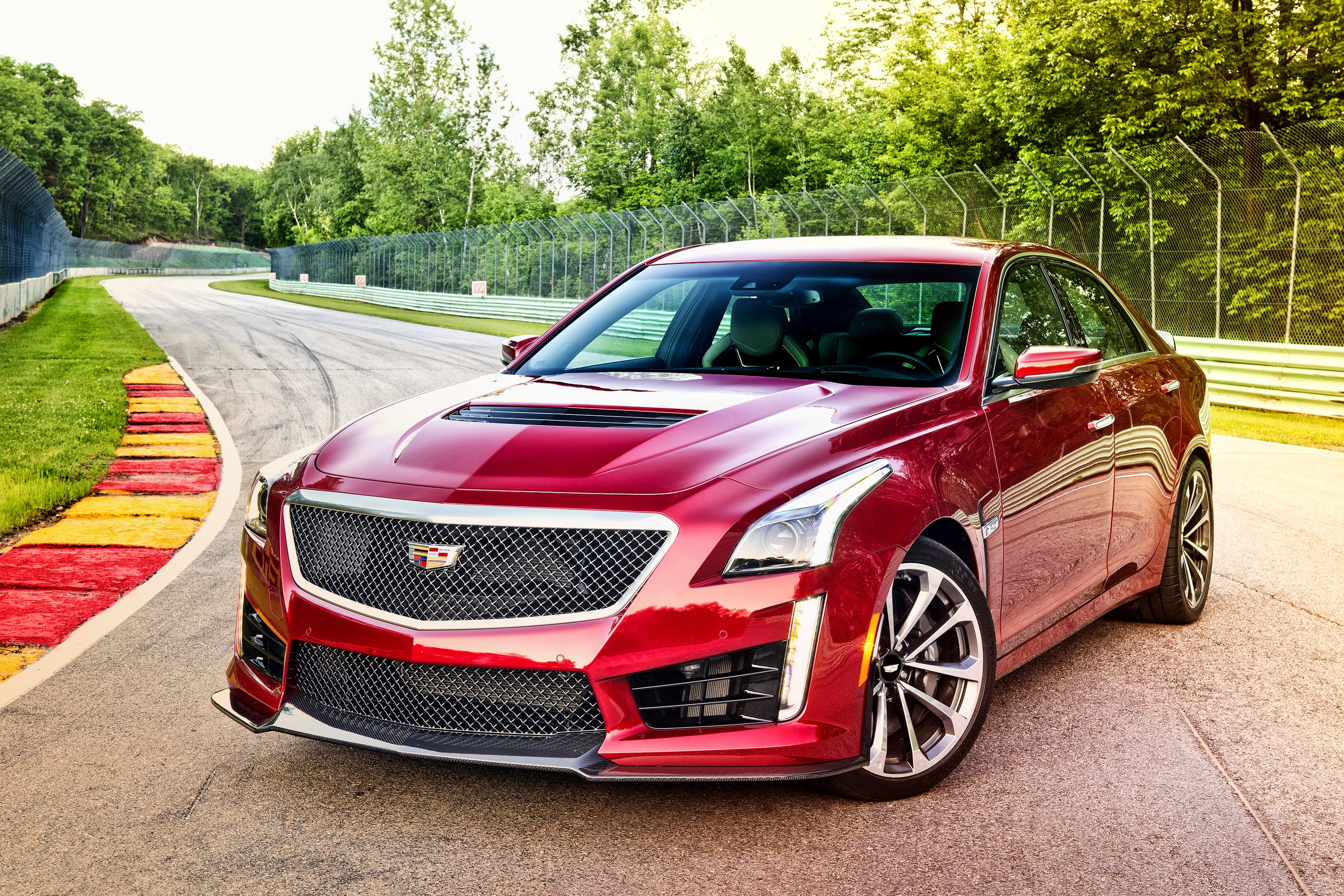 Red 2015 Cadillac CTS-V on a Racetrack HD Wallpaper