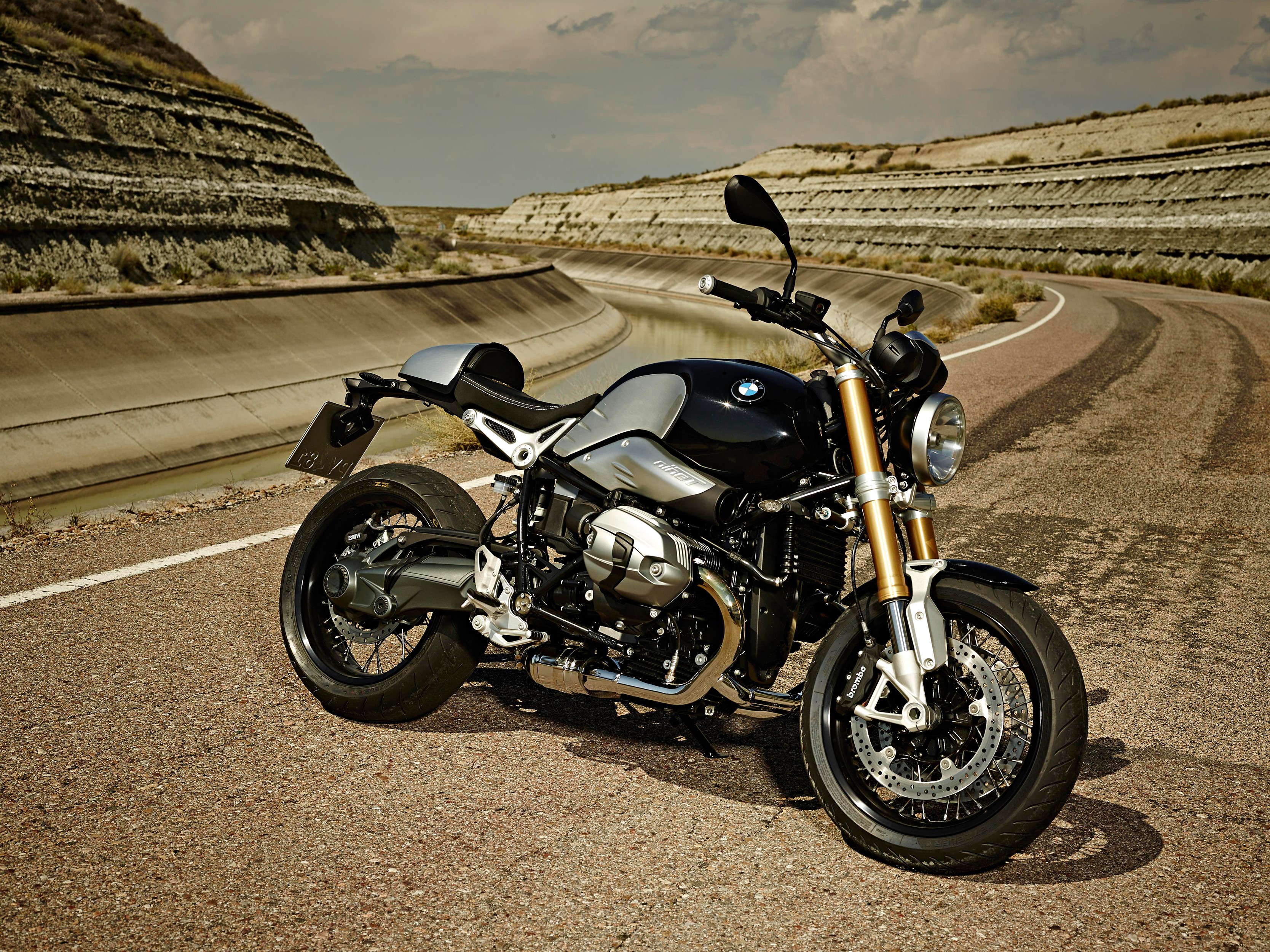 BMW R nineT motorcycle on a road HD Wallpaper