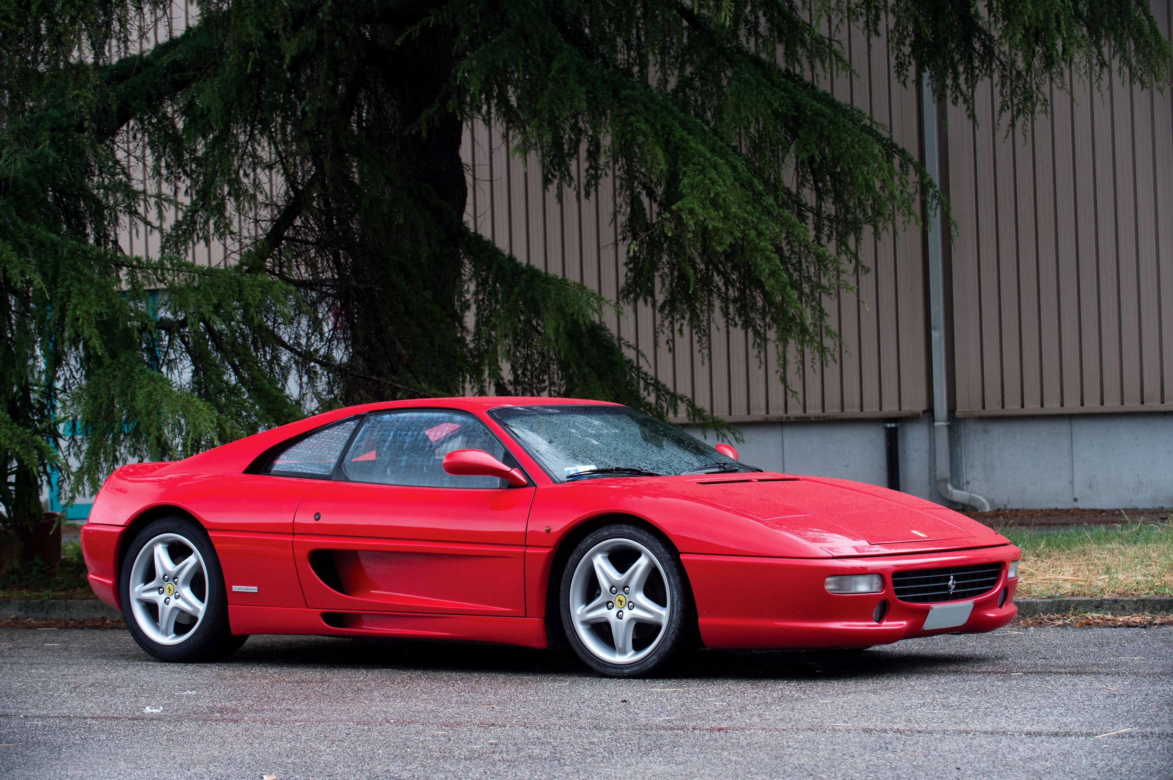 Red Ferrari F355 Berlinetta parked outside HD Wallpaper