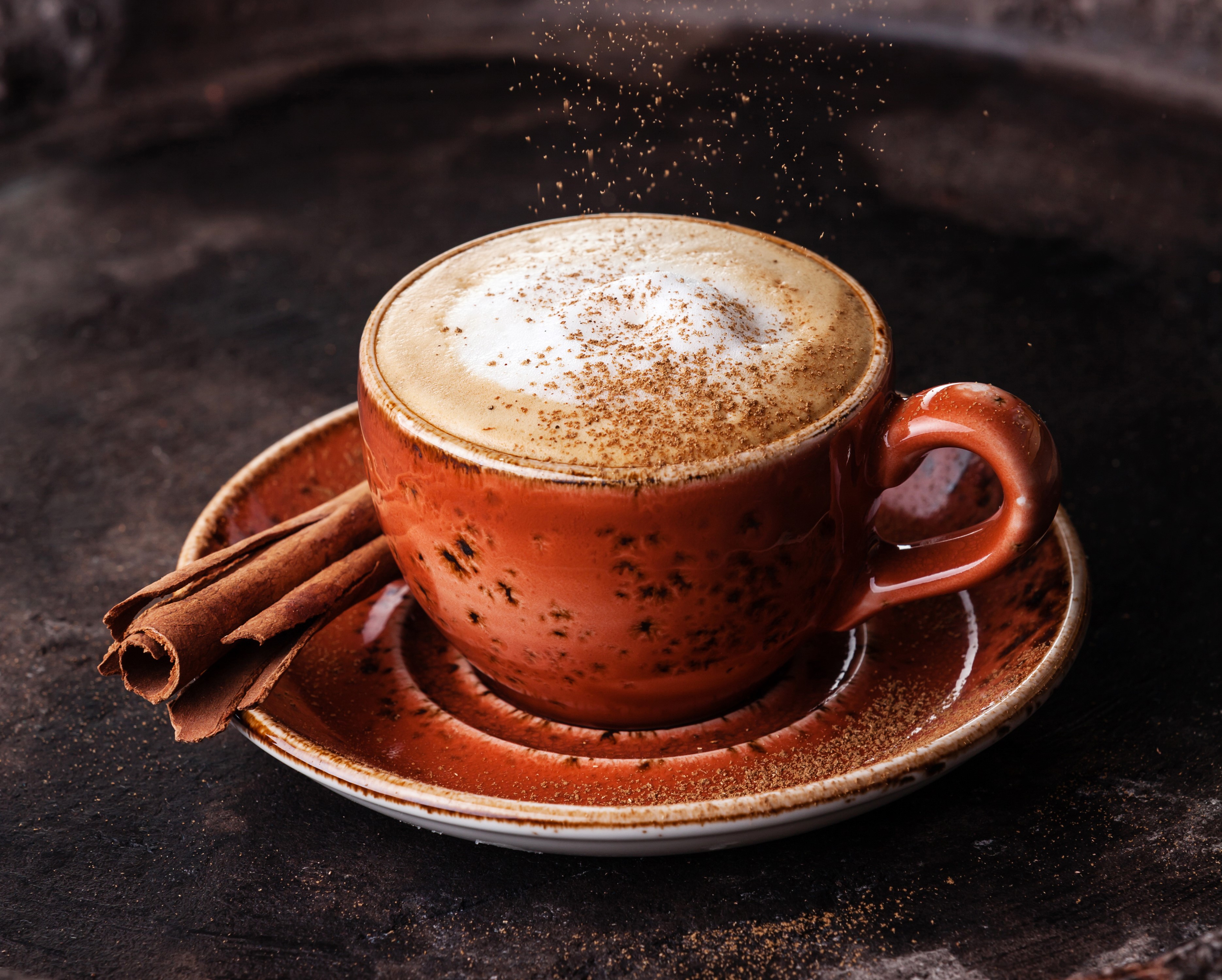 Cappuccino with cinnamon and cinnamon sticks HD Wallpaper