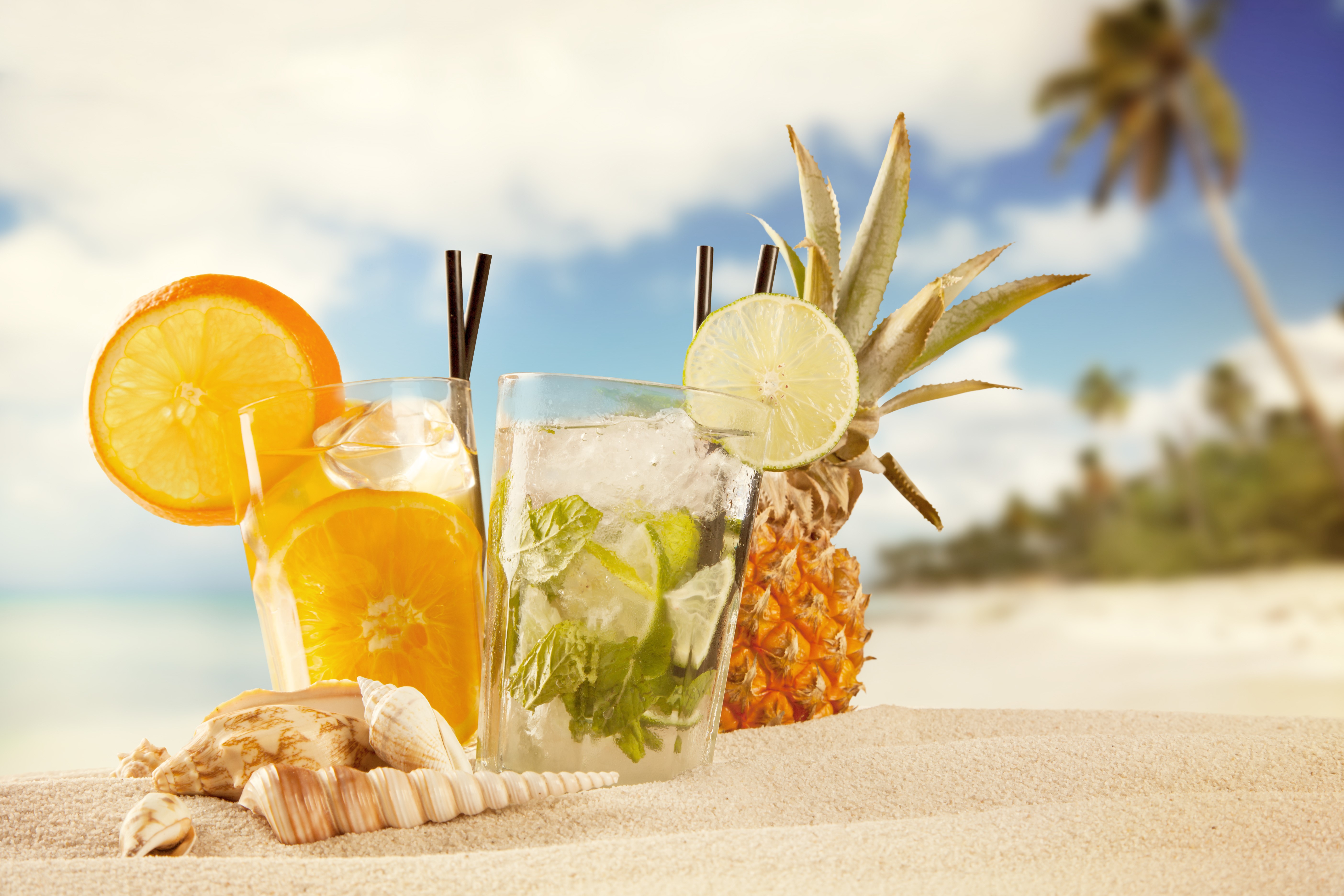 Tropical Drinks on a Sandy Beach with Pineapple and Shells HD Wallpaper