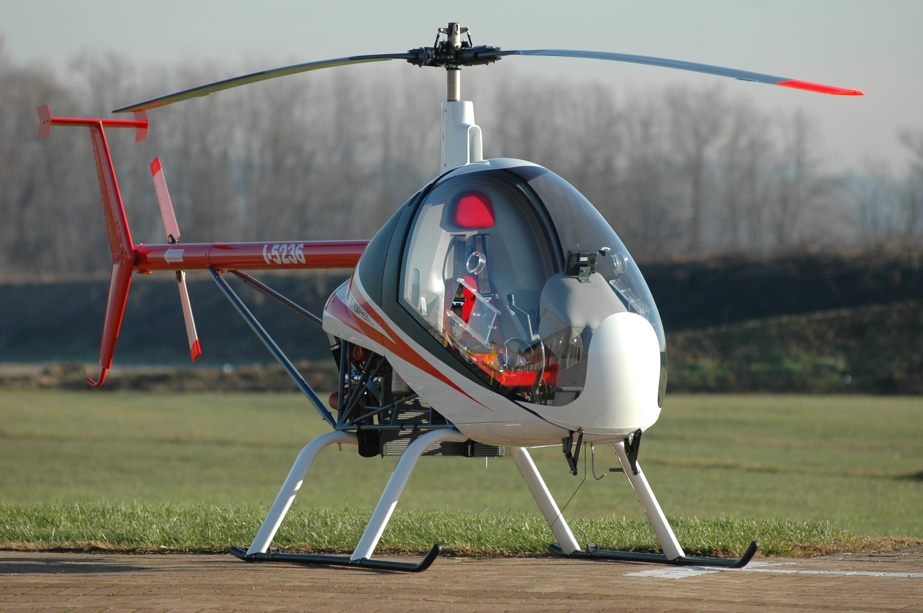 CH-7 Kompress Charlie helicopter on a runway HD Wallpaper