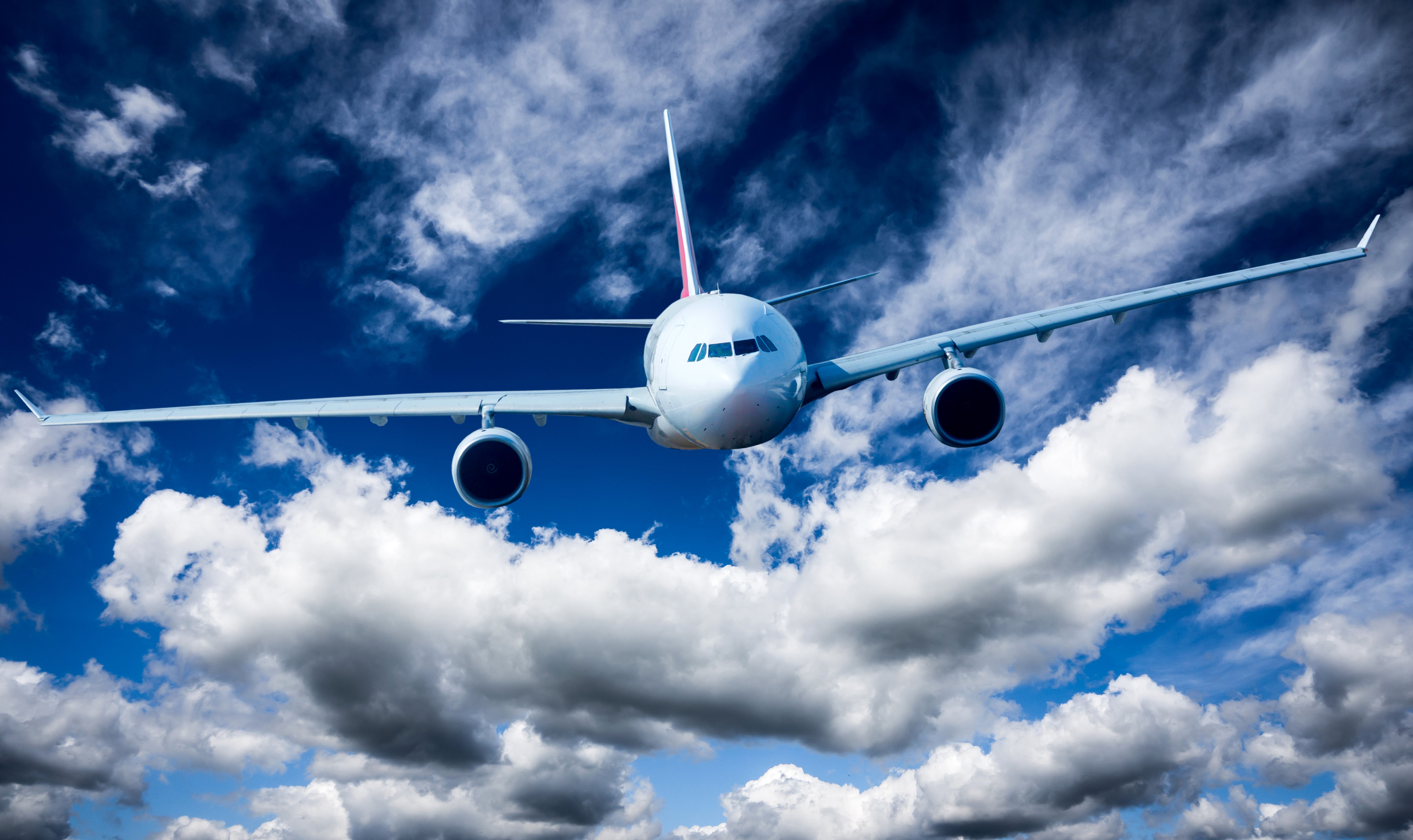 Airplane flying through clouds HD Wallpaper