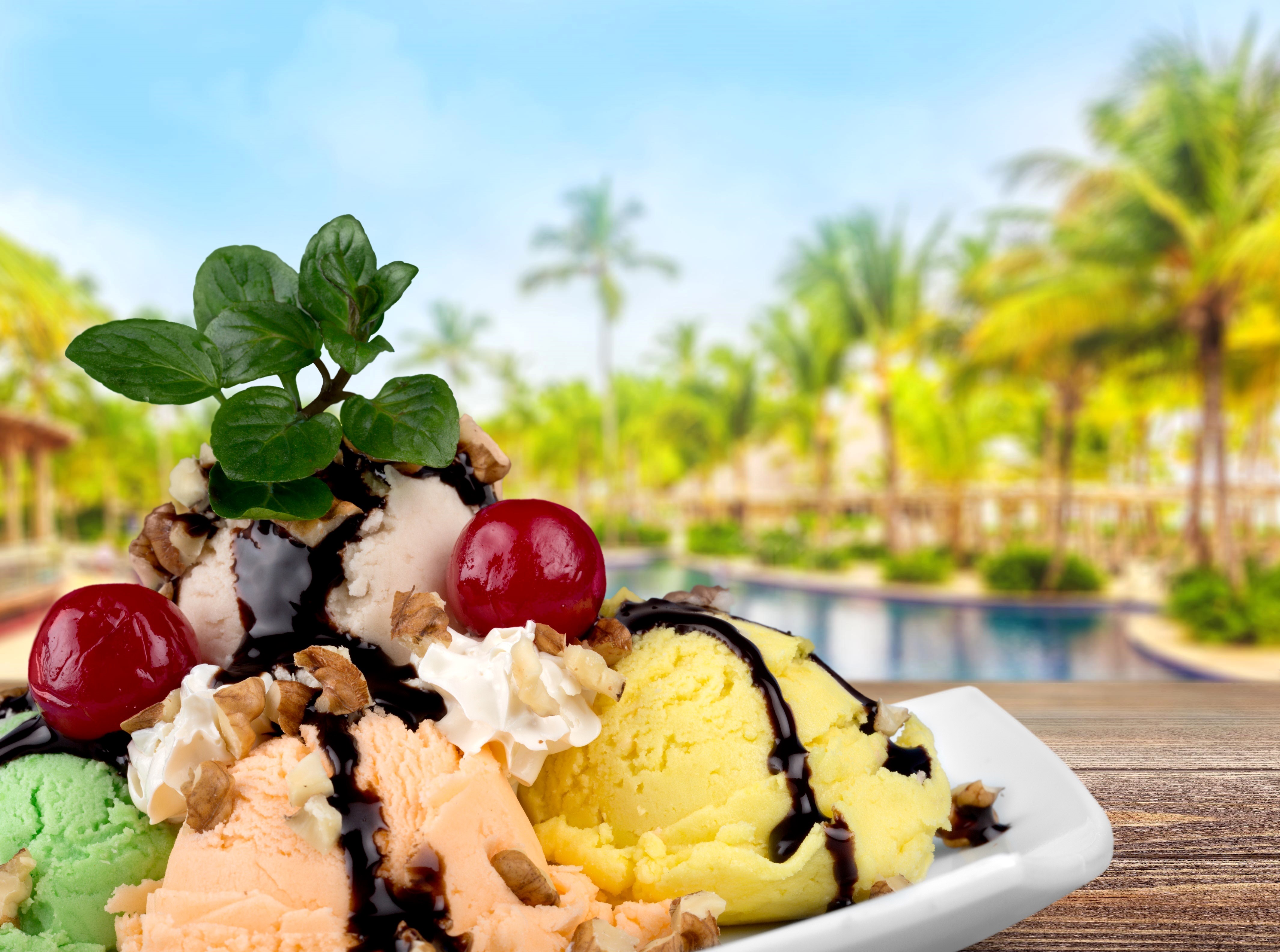 Ice cream sundae with cherries and nuts HD Wallpaper