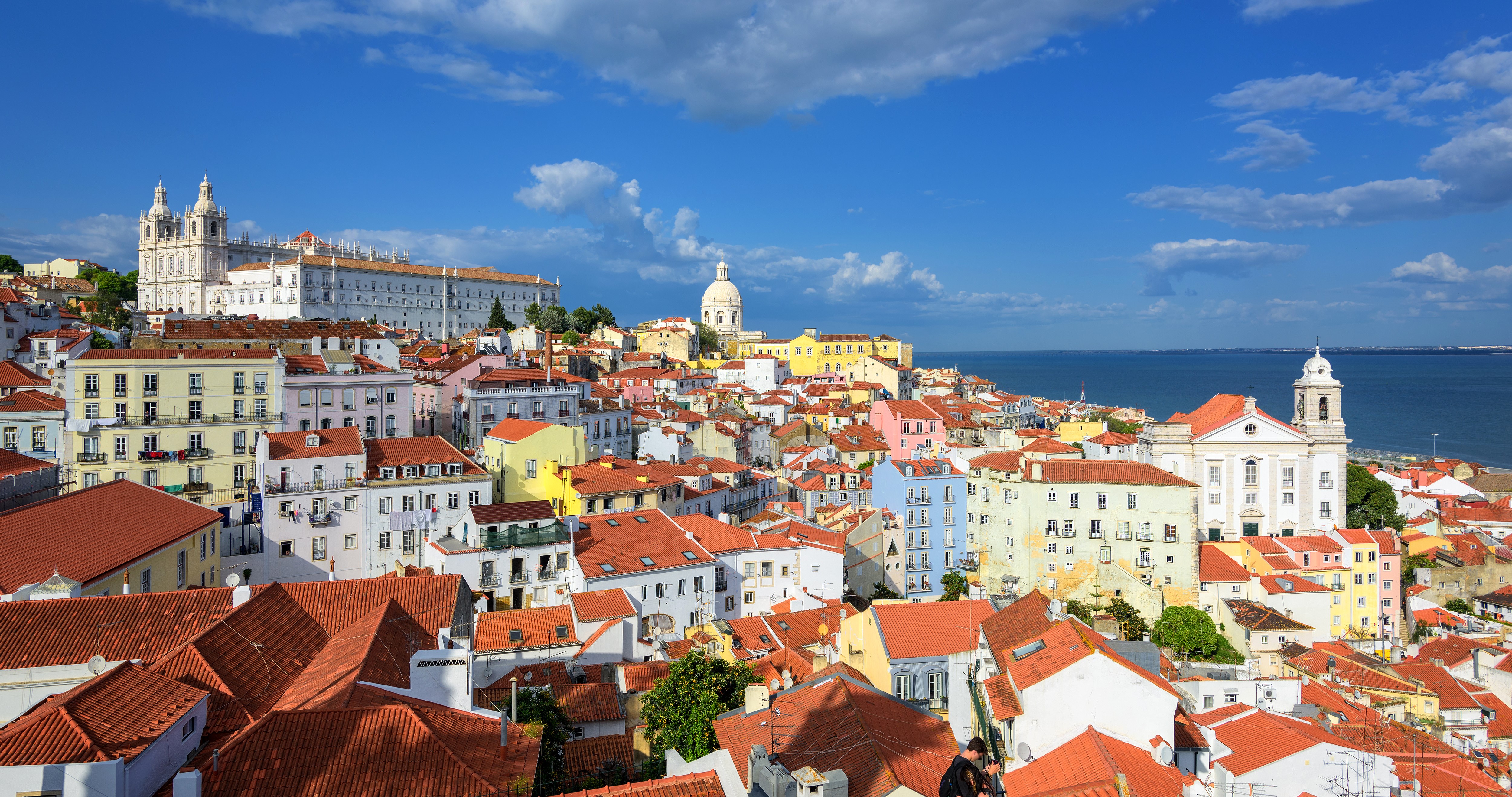 Lisbon, Portugal cityscape with colorful houses and churches HD Wallpaper
