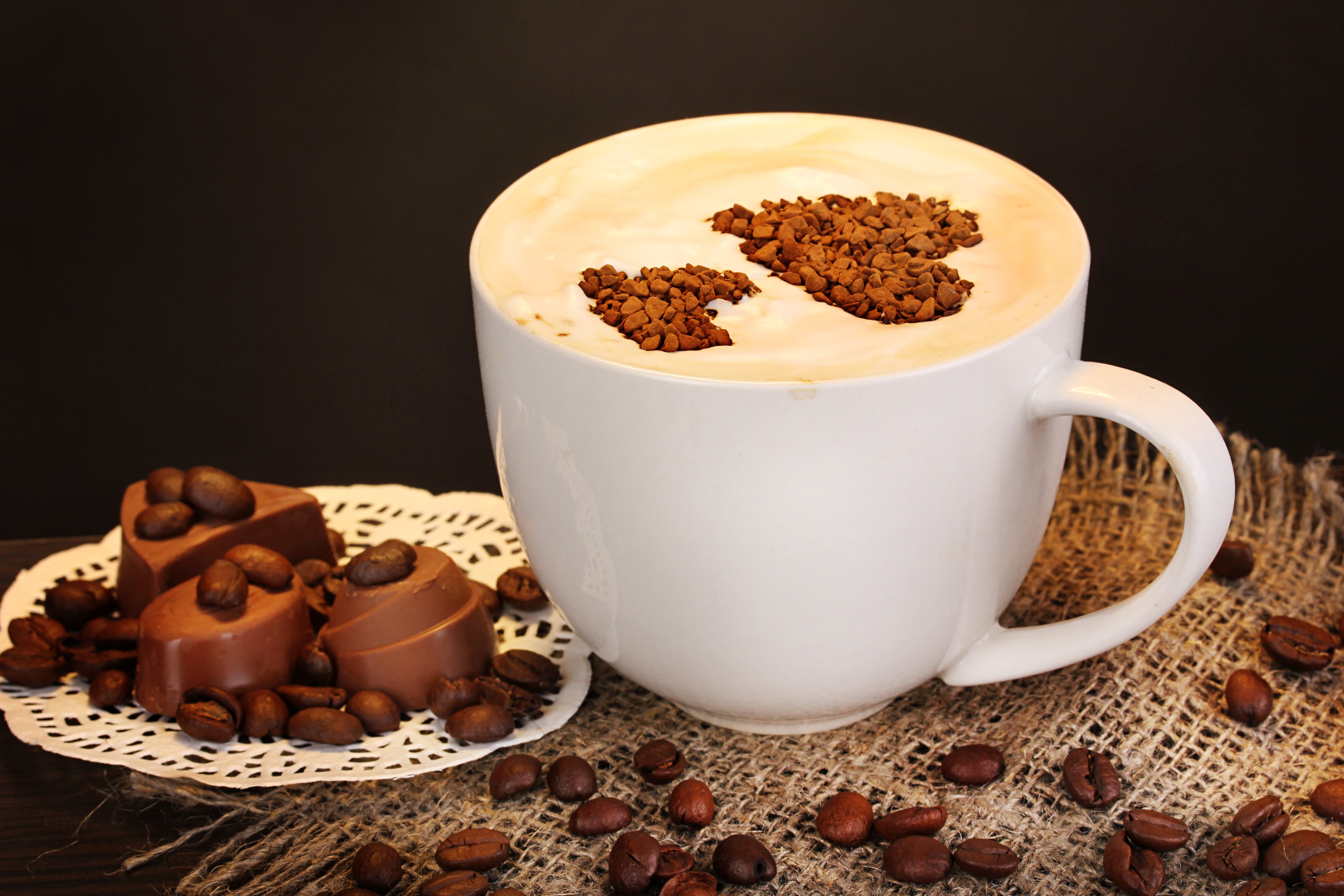 Coffee cup with chocolate and coffee beans HD Wallpaper