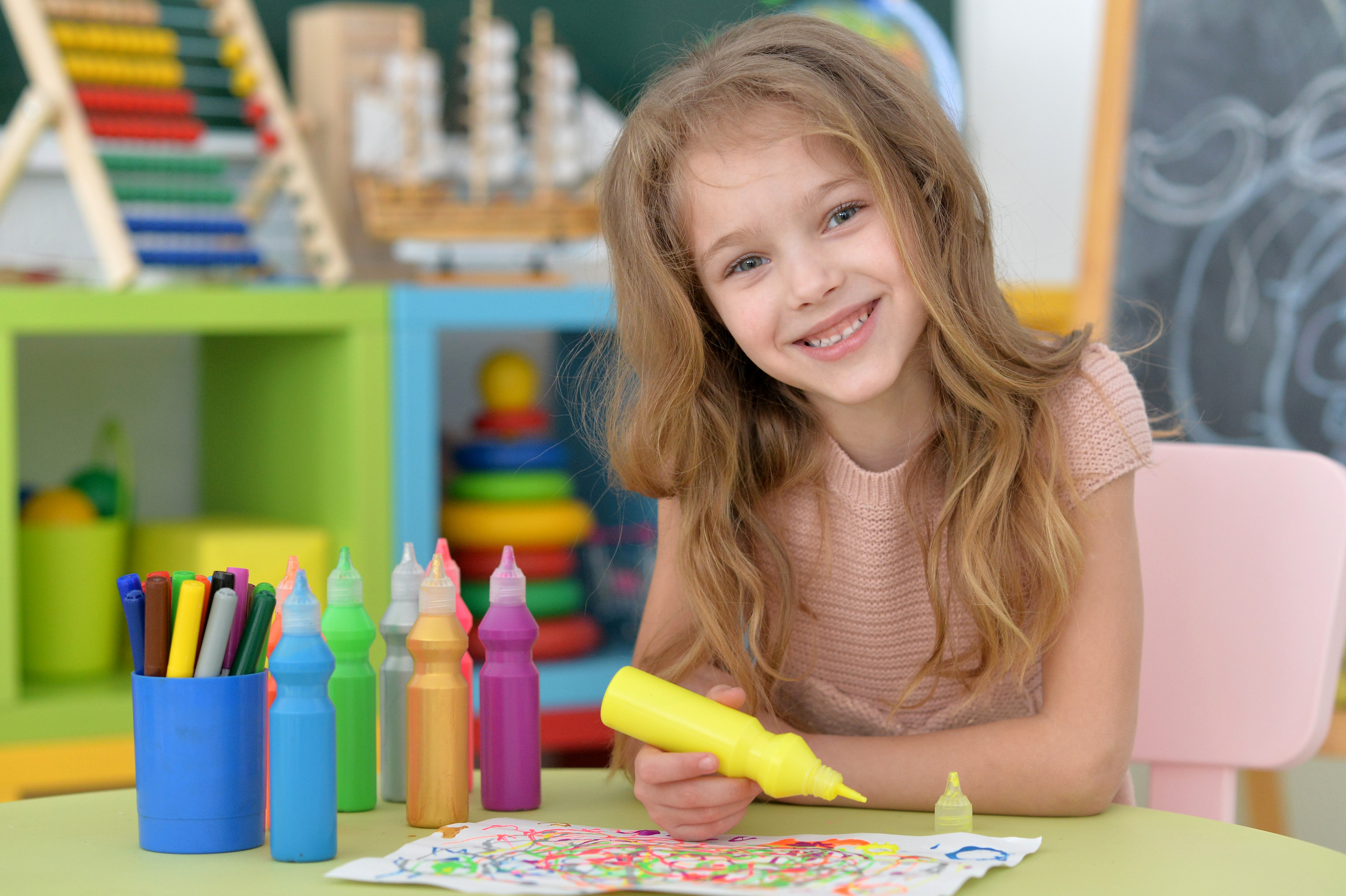 Girl with Pencils and Paint Bottles HD Wallpaper