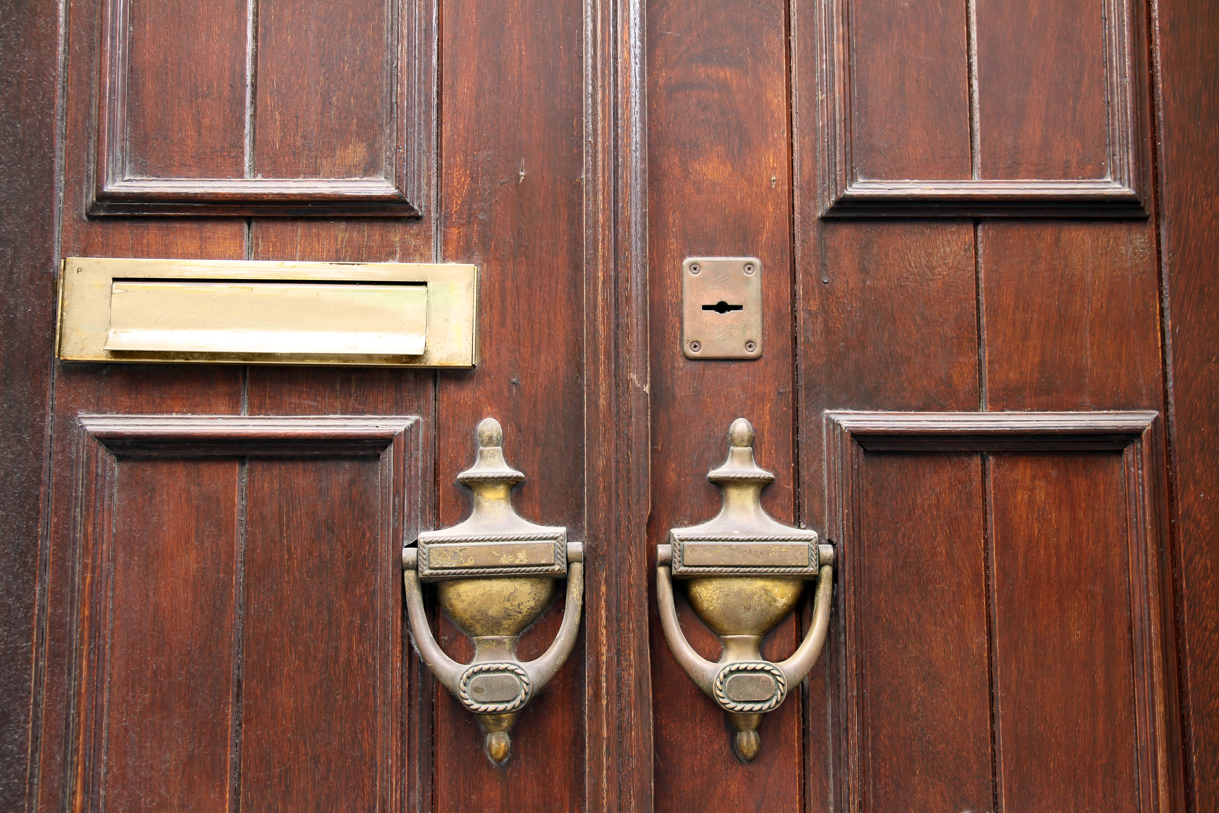 Wooden Double Doors with Brass Mail Slot and Knockers HD Wallpaper