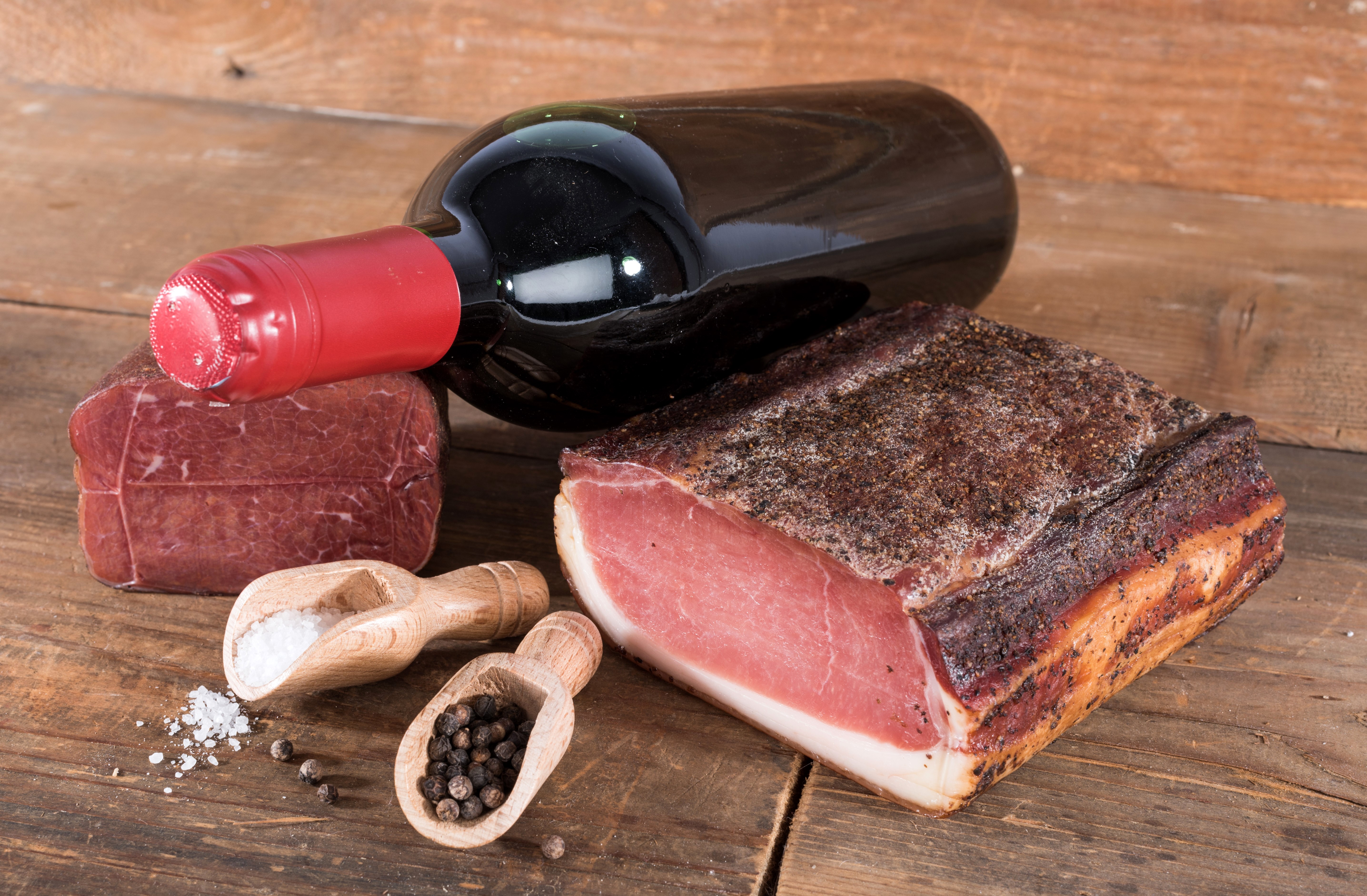 Bottle of Wine with Cured Meats and Spices HD Wallpaper