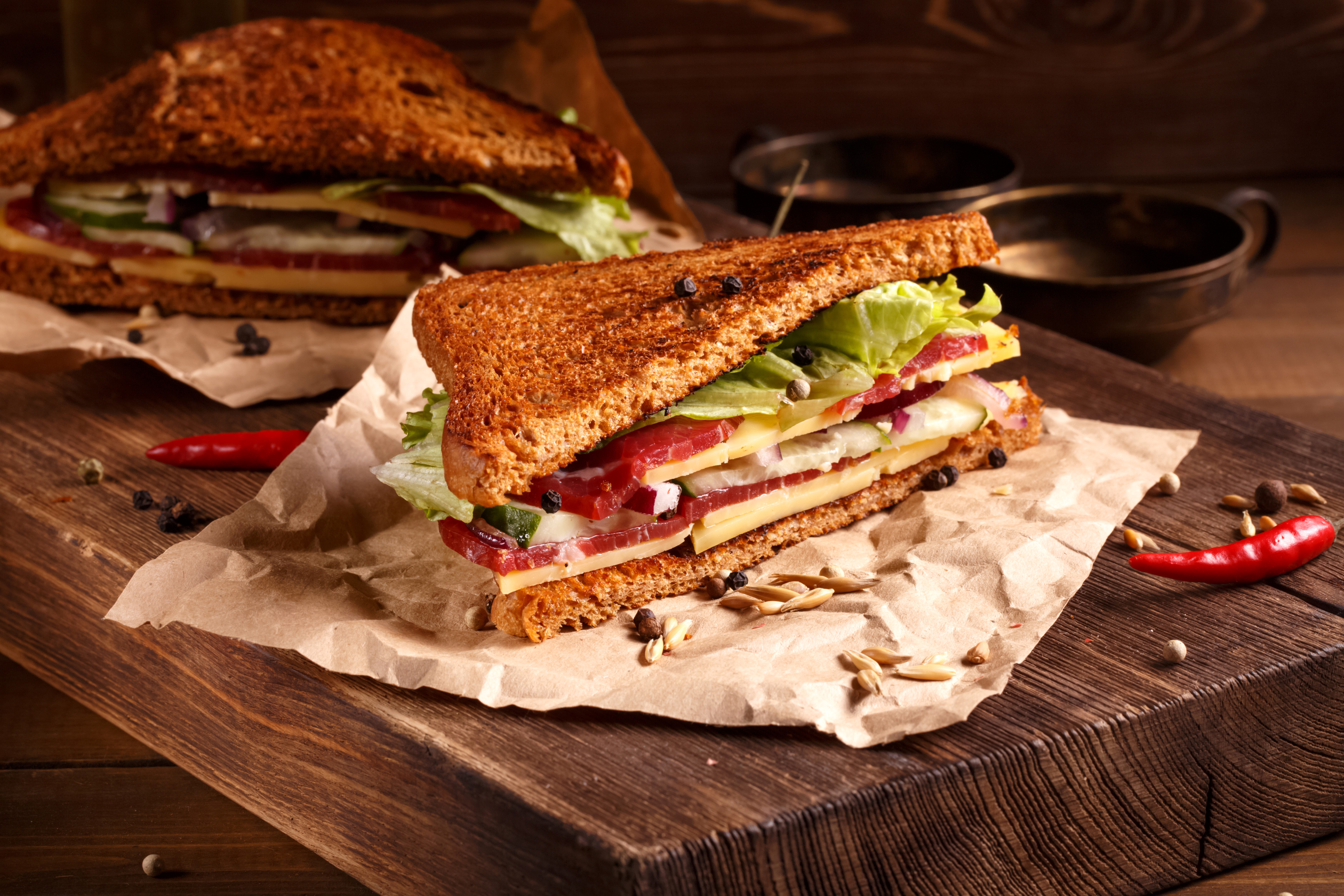 Sandwich with cheese, salami, cucumber, and lettuce on toast HD Wallpaper