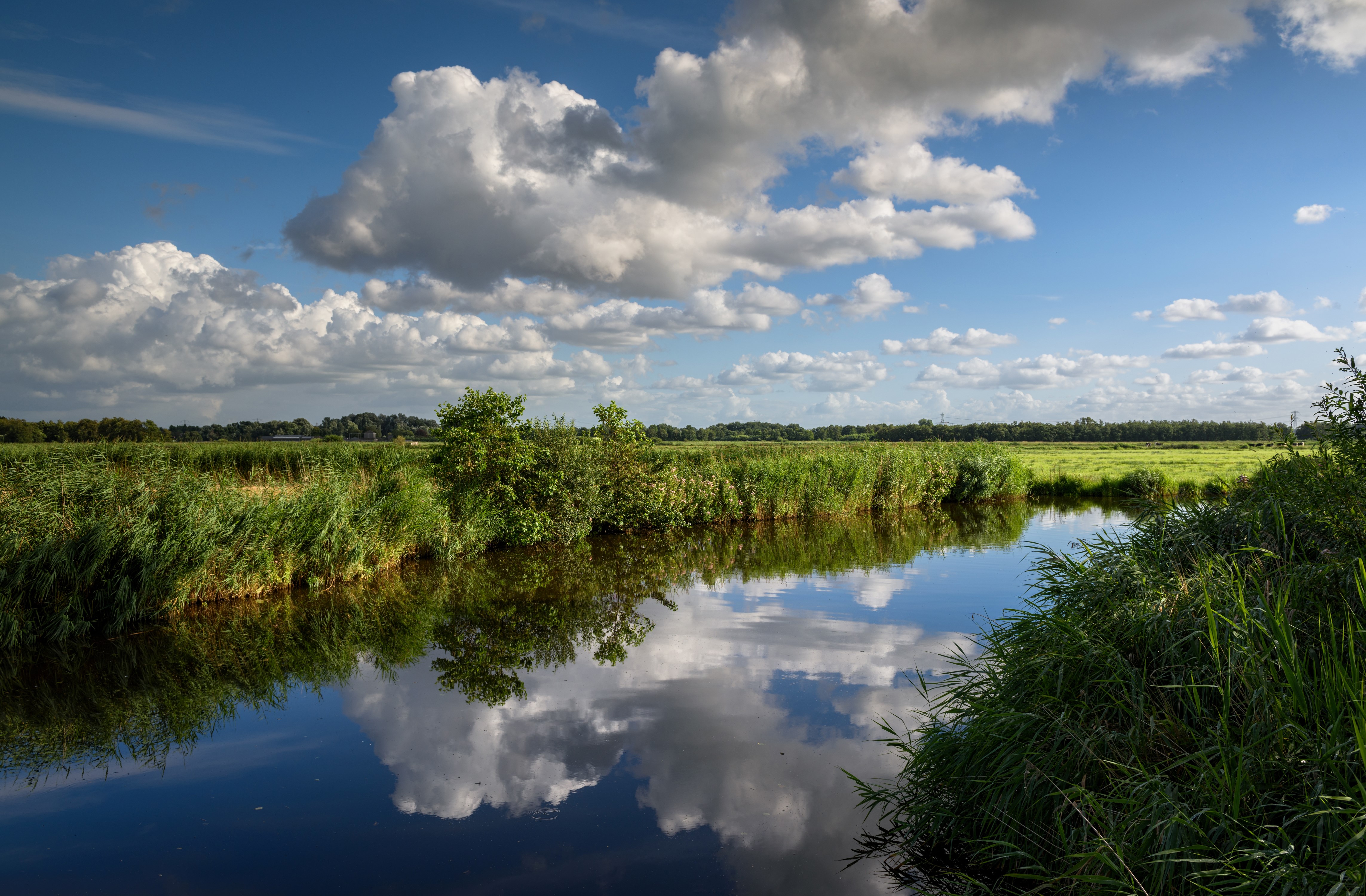 River and clouds in Oudendijk, Netherlands HD Wallpaper