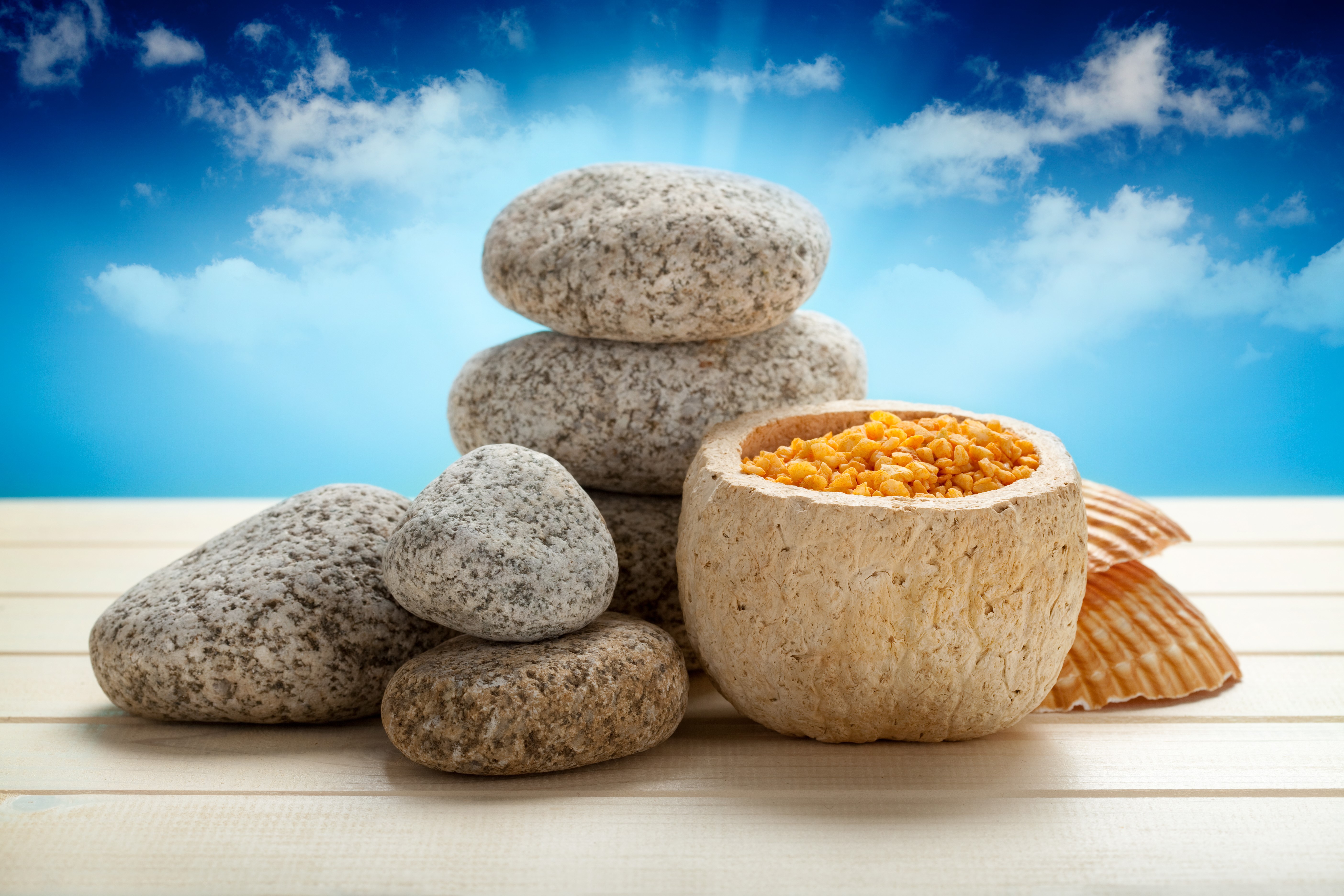 Spa stones and salt with shells and sky HD Wallpaper