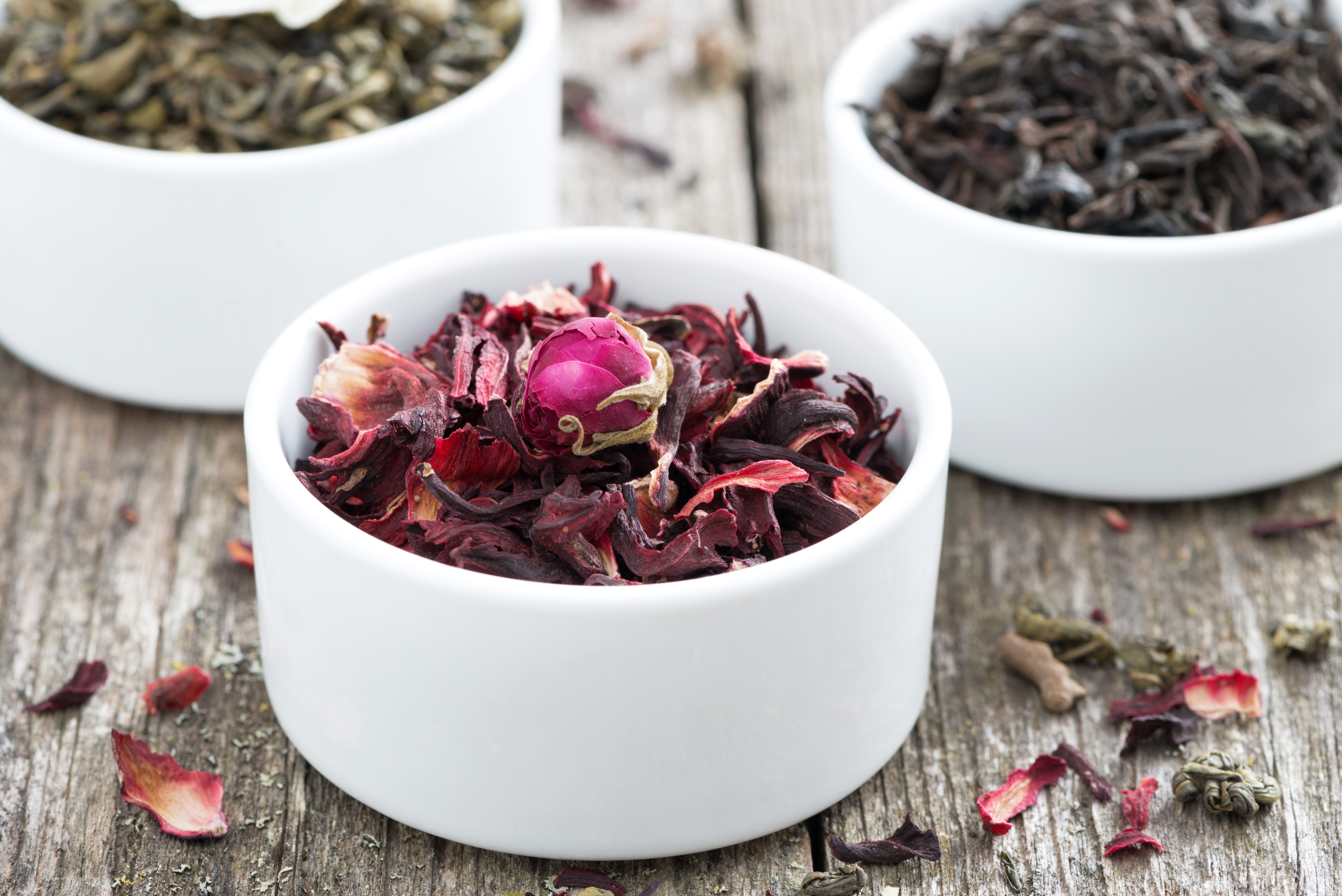 Bowls of Dry Tea Leaves and Rose Bud HD Wallpaper