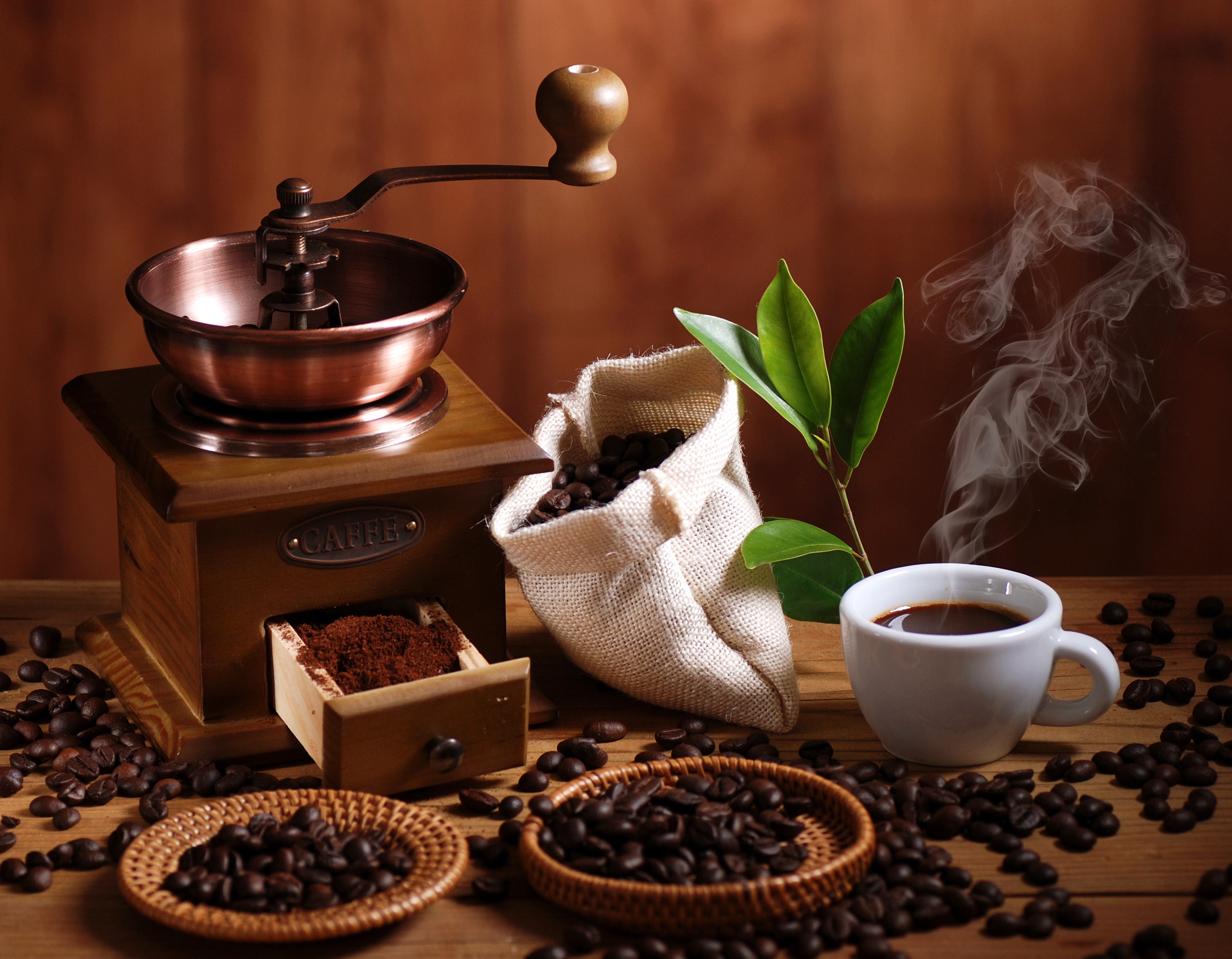 Coffee grinder, coffee beans, and a cup of coffee HD Wallpaper
