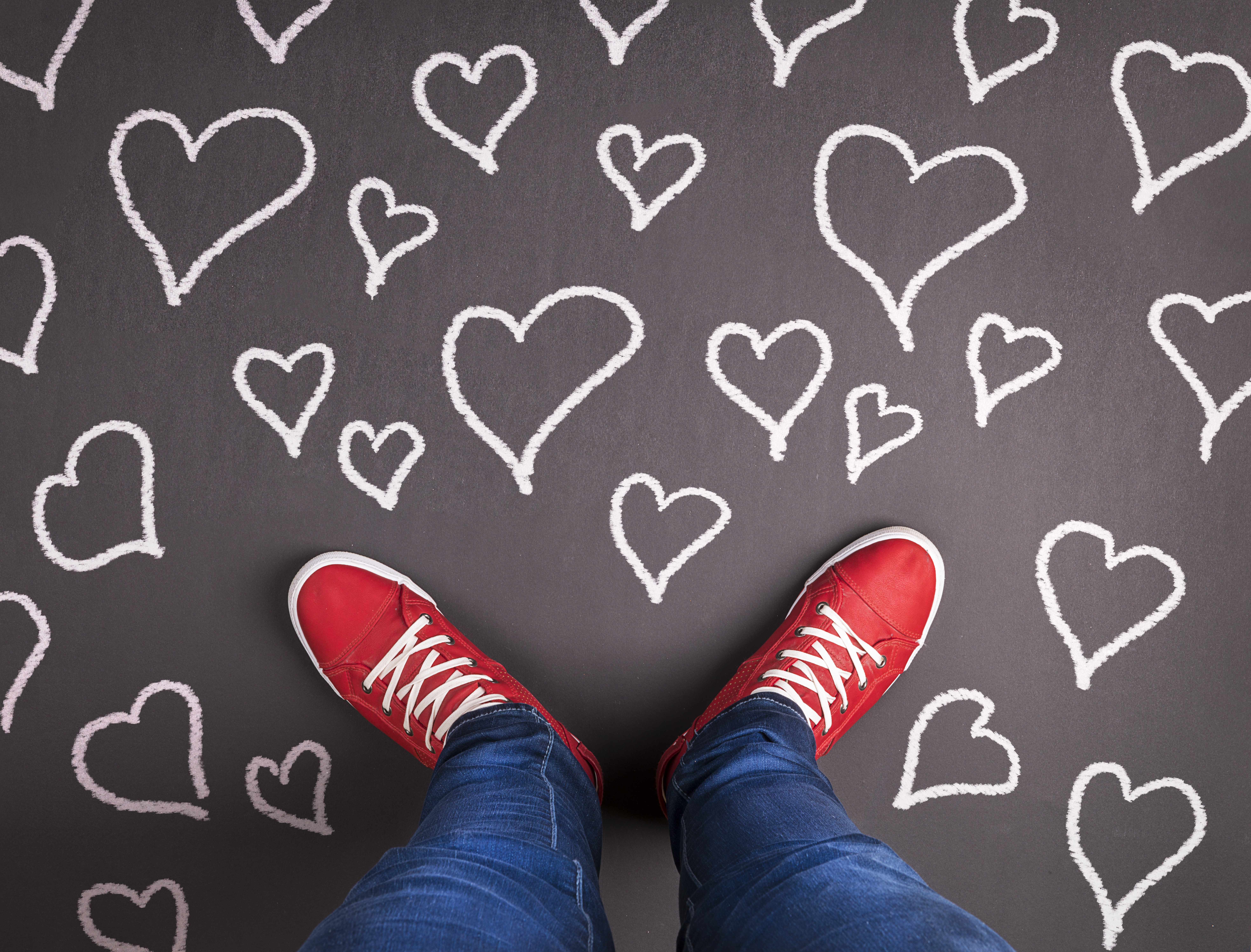 Legs in Jeans and Red Shoes on Chalk Heart Background HD Wallpaper