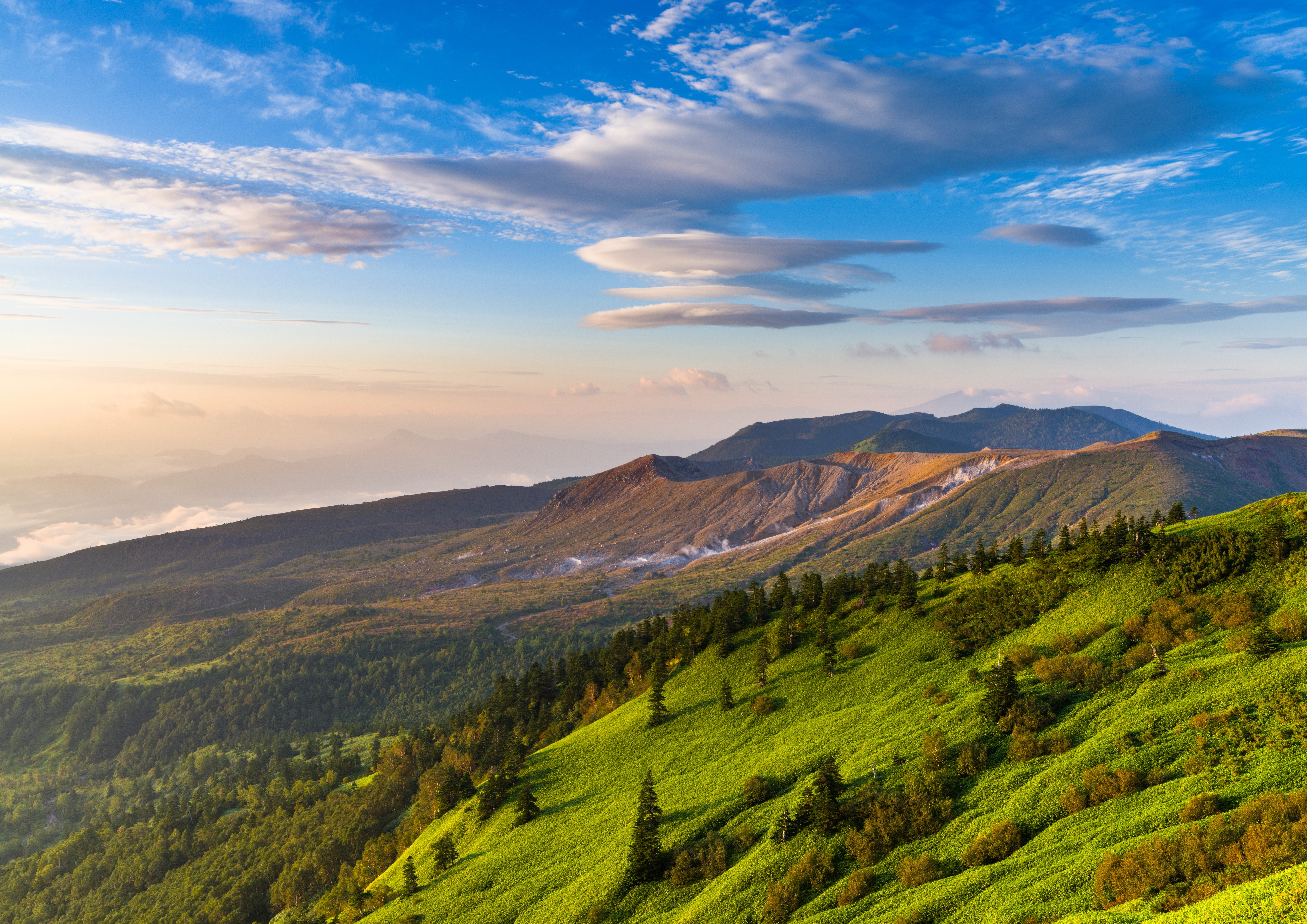 Mountain landscape with green hills and blue sky HD Wallpaper