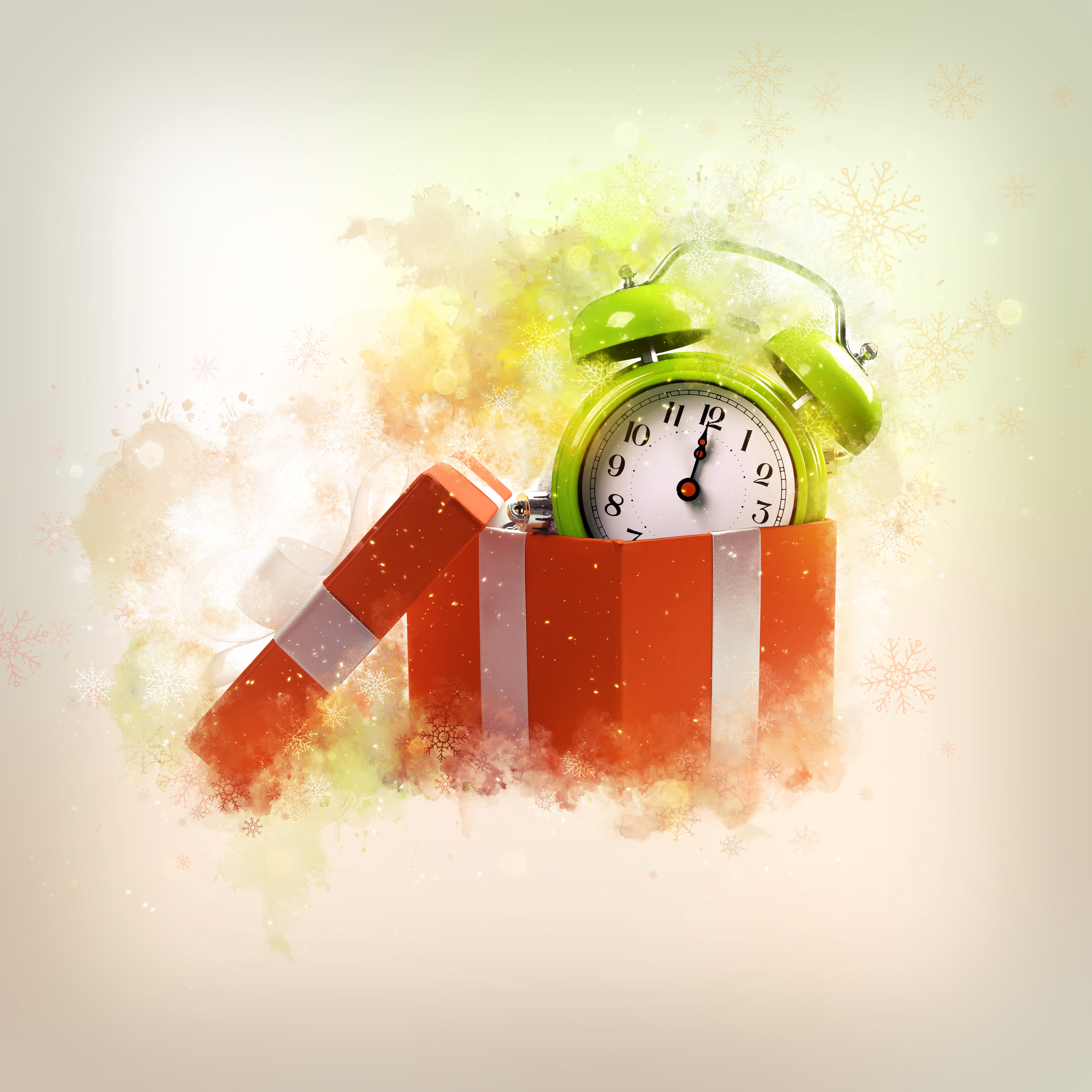 Green alarm clock in an open gift box HD Wallpaper
