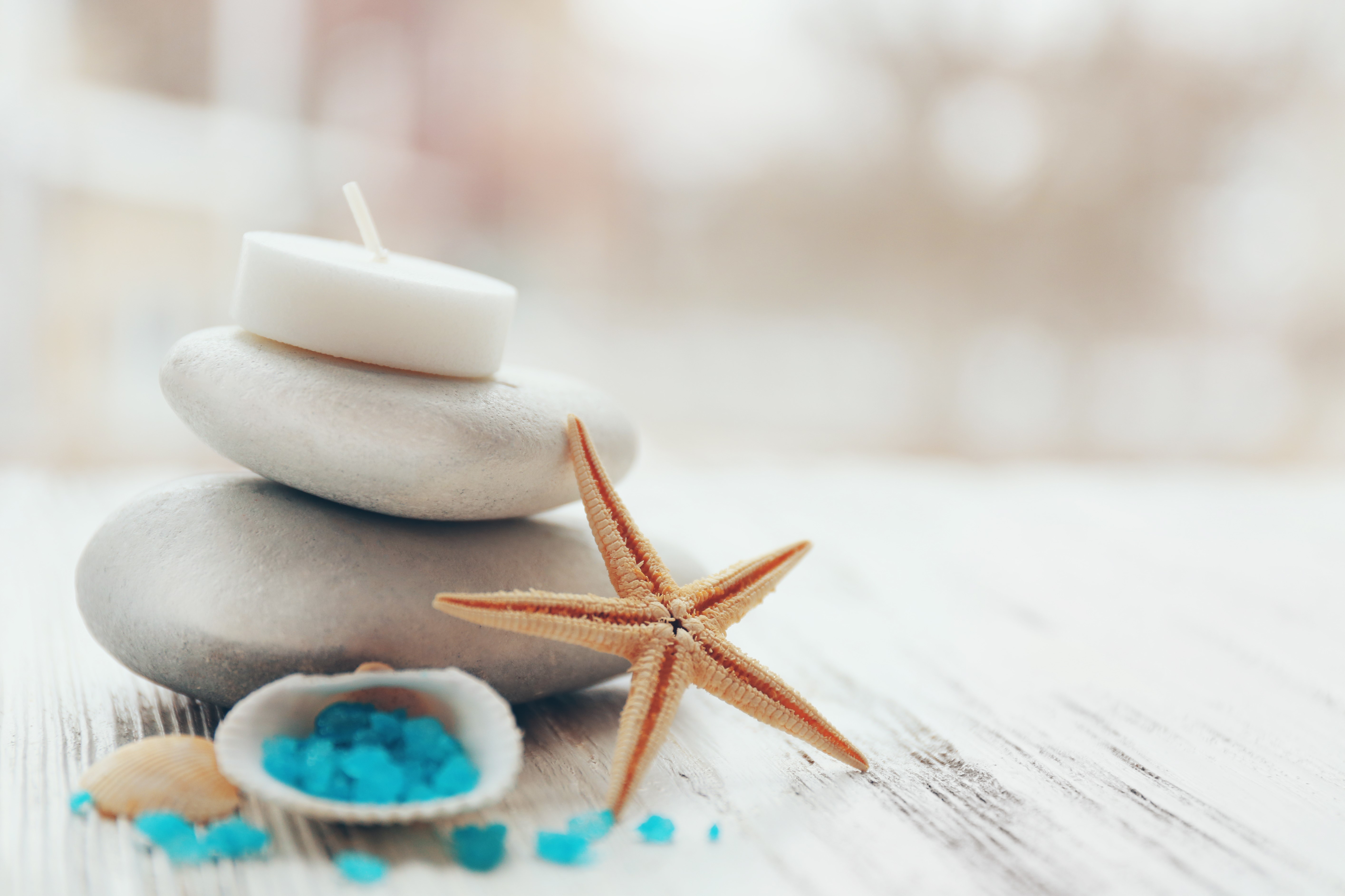 Spa stones, starfish, candle, and blue salt HD Wallpaper
