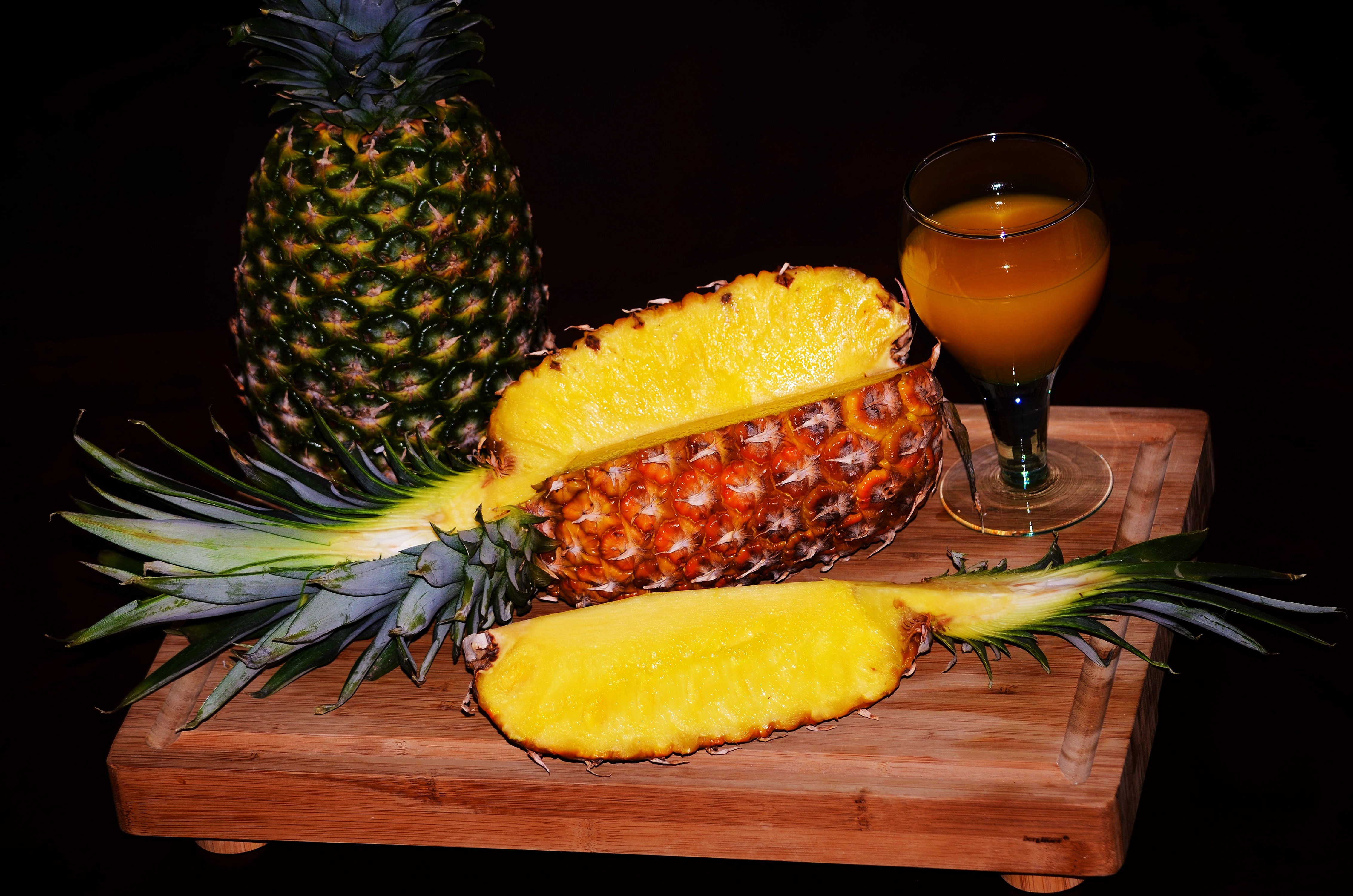 Pineapples and Juice on Cutting Board HD Wallpaper