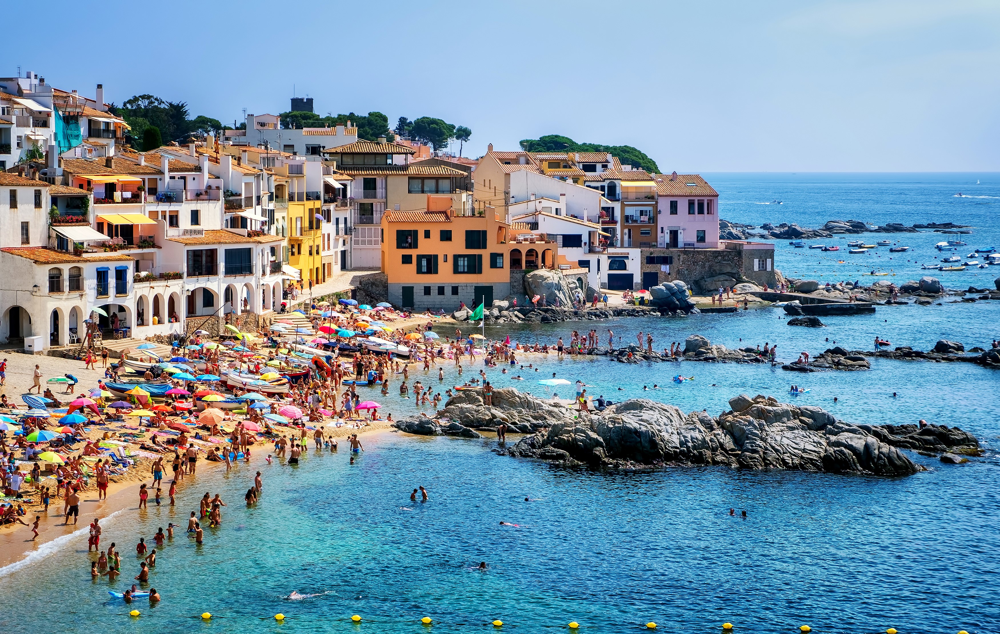 Calella de Palafrugell, Catalonia, Spain beach with houses and people HD Wallpaper