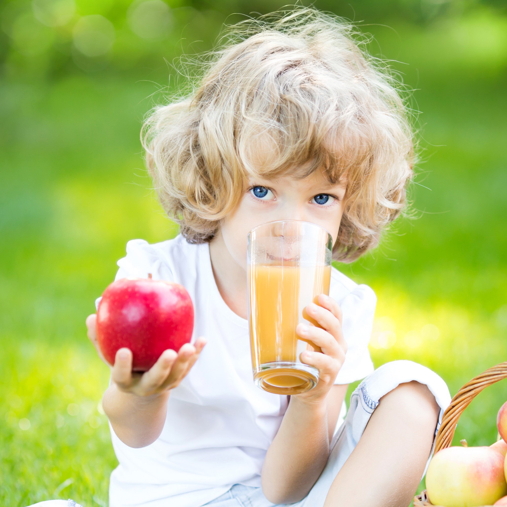 Blonde girl drinking juice and holding an apple HD Wallpaper