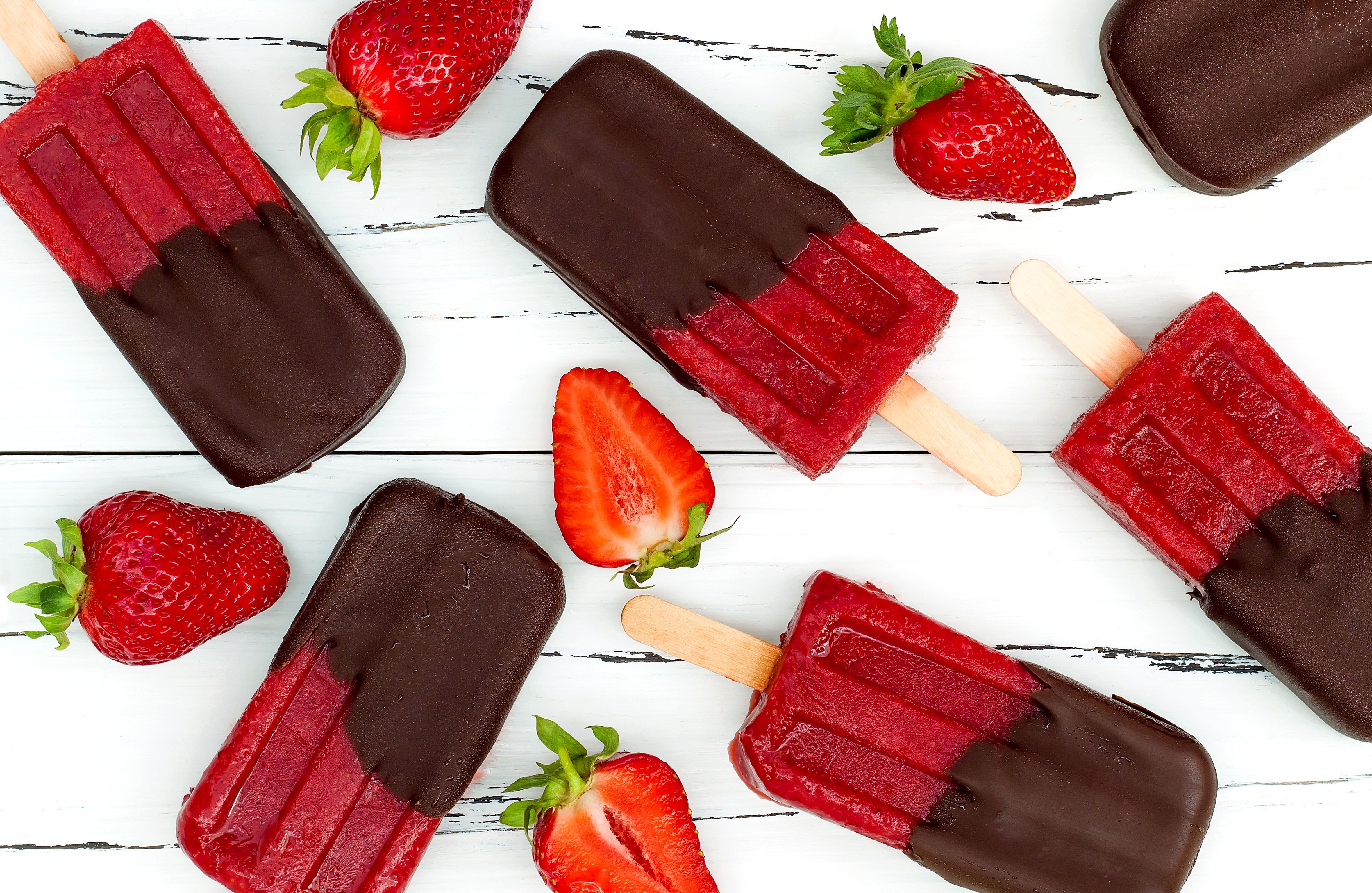 Chocolate Dipped Strawberry Popsicles on Wood Planks HD Wallpaper