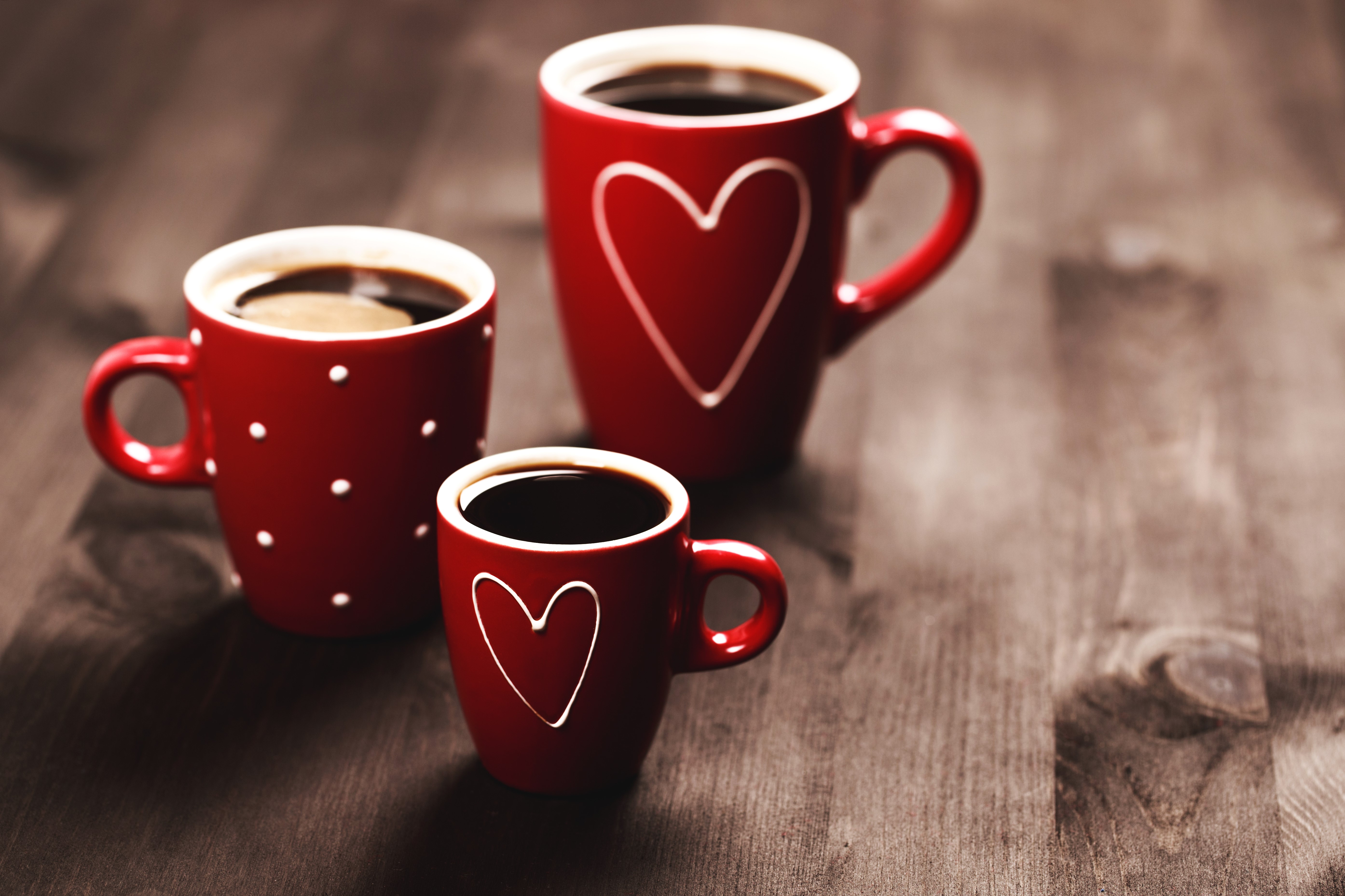 Three red mugs with coffee and hearts HD Wallpaper