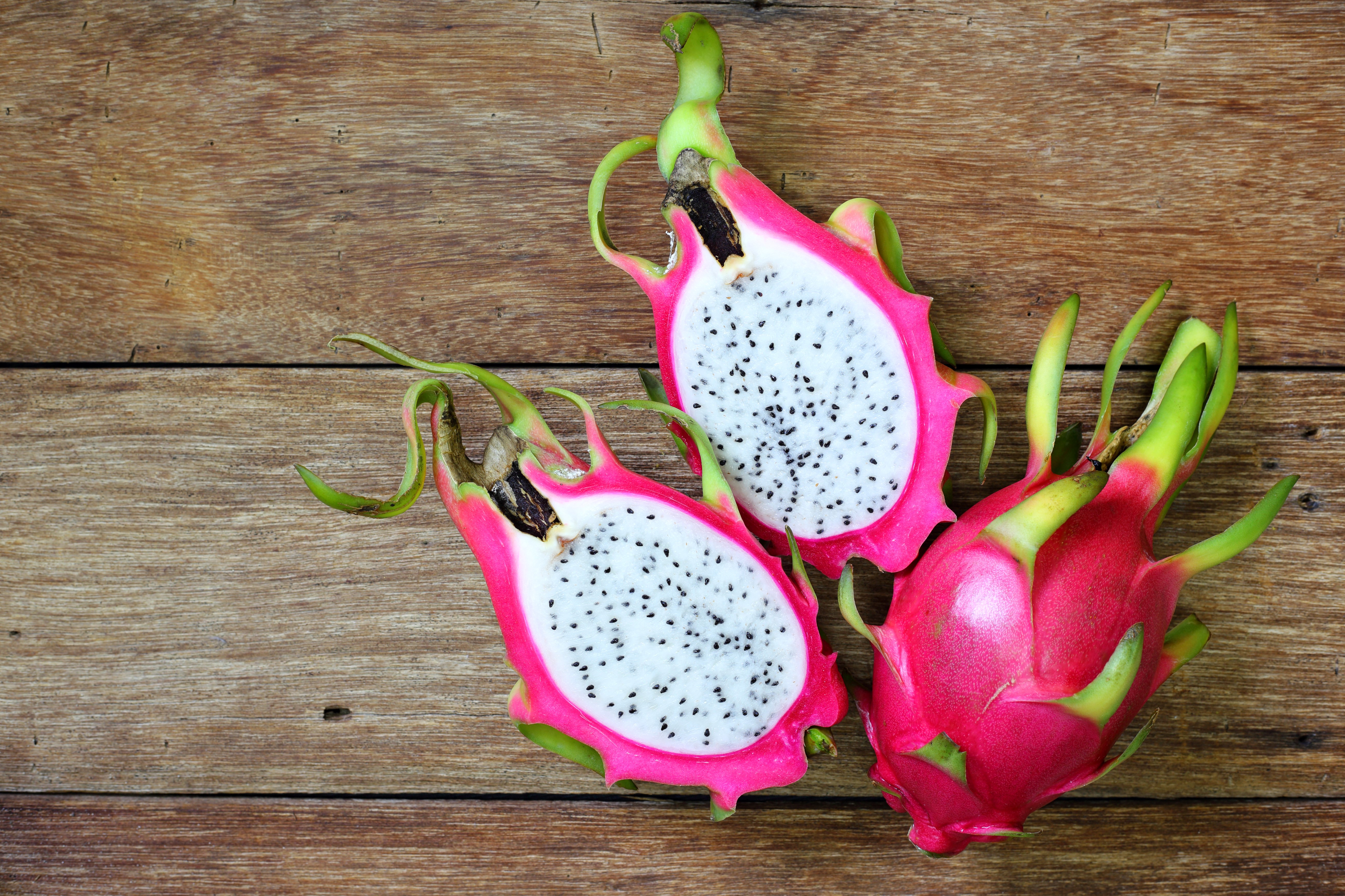 Dragon fruit on wood planks HD Wallpaper