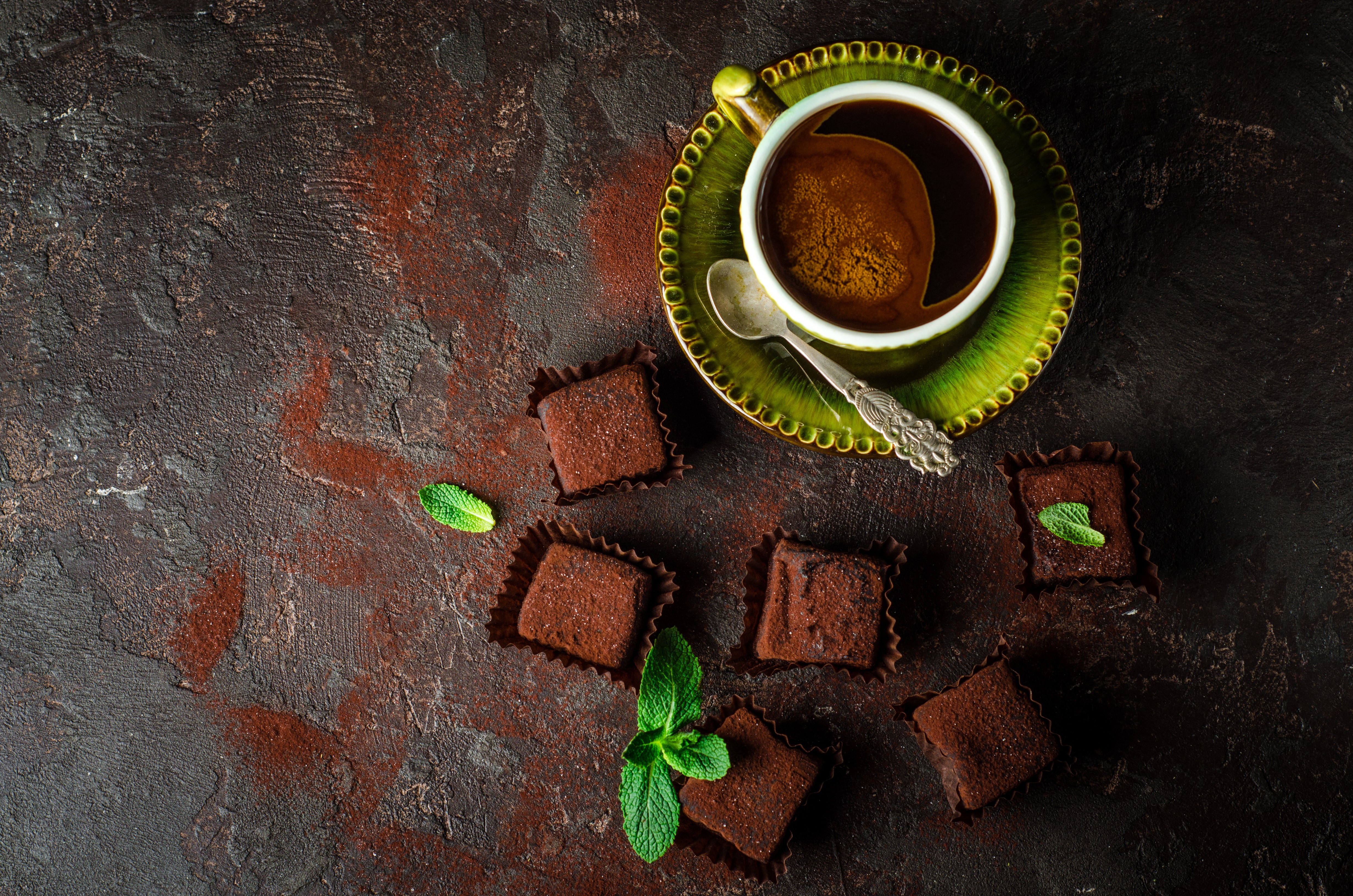 Coffee cup with chocolate truffles and mint HD Wallpaper