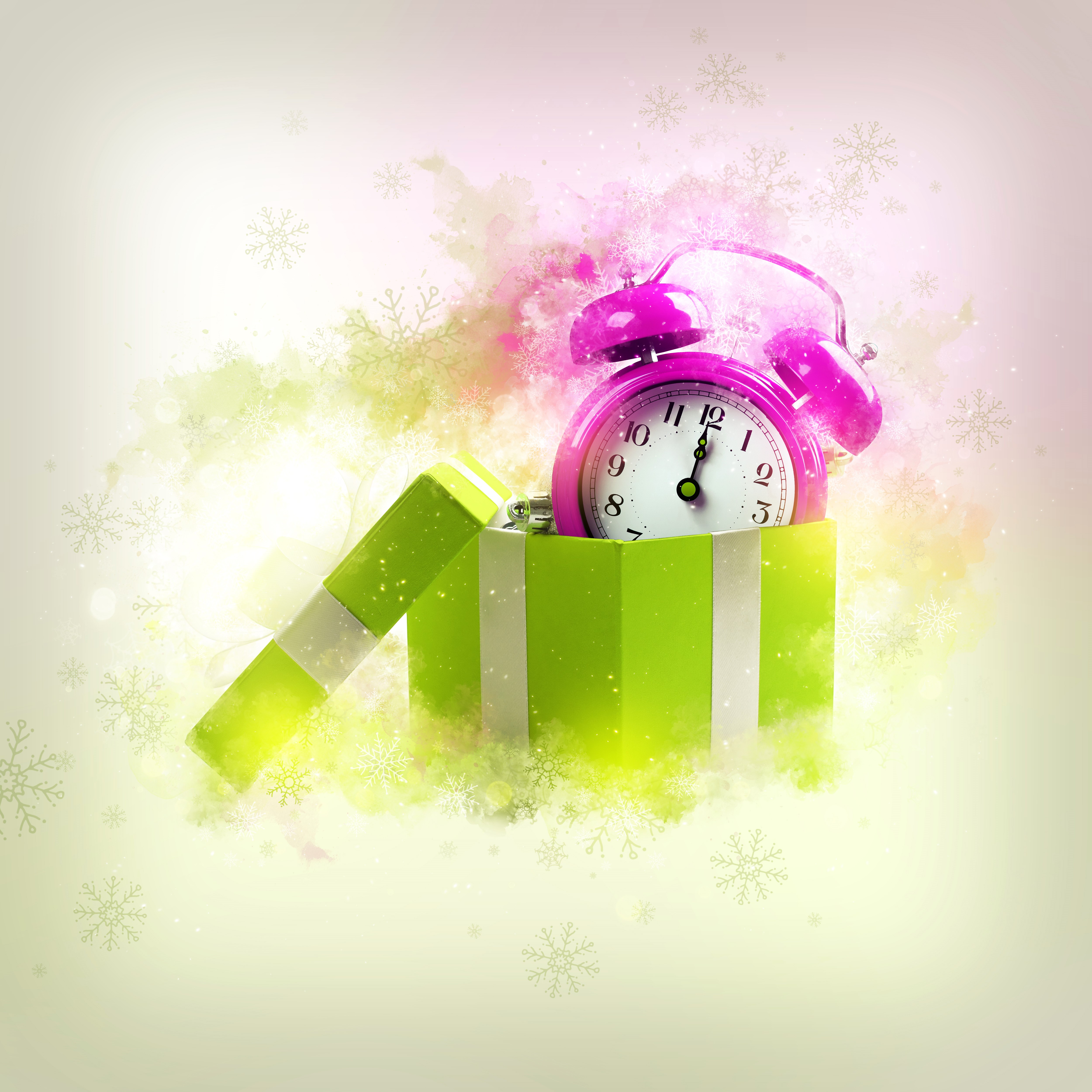 Pink alarm clock in a green gift box with snowflakes HD Wallpaper