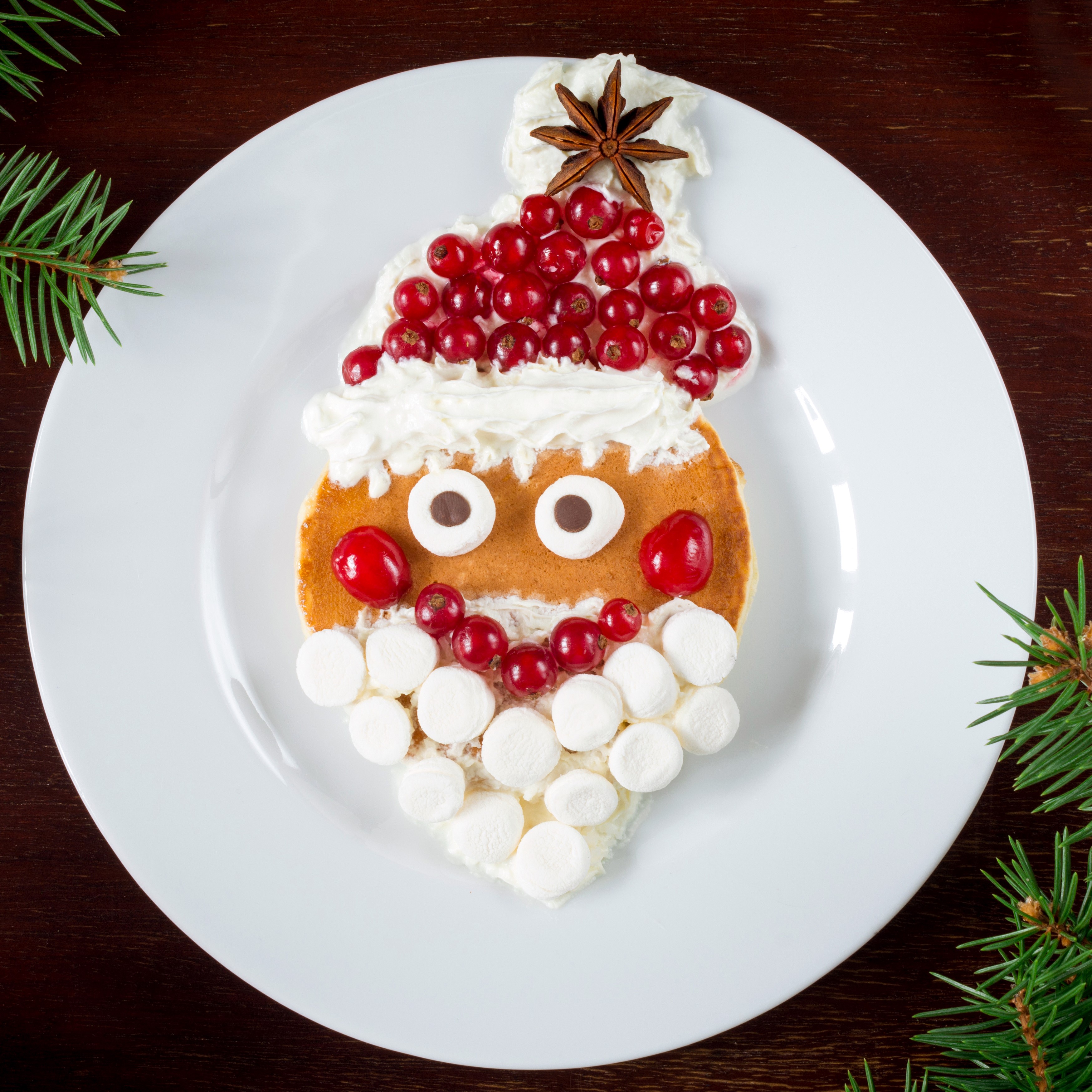 Santa Claus pancake with currants and marshmallows HD Wallpaper