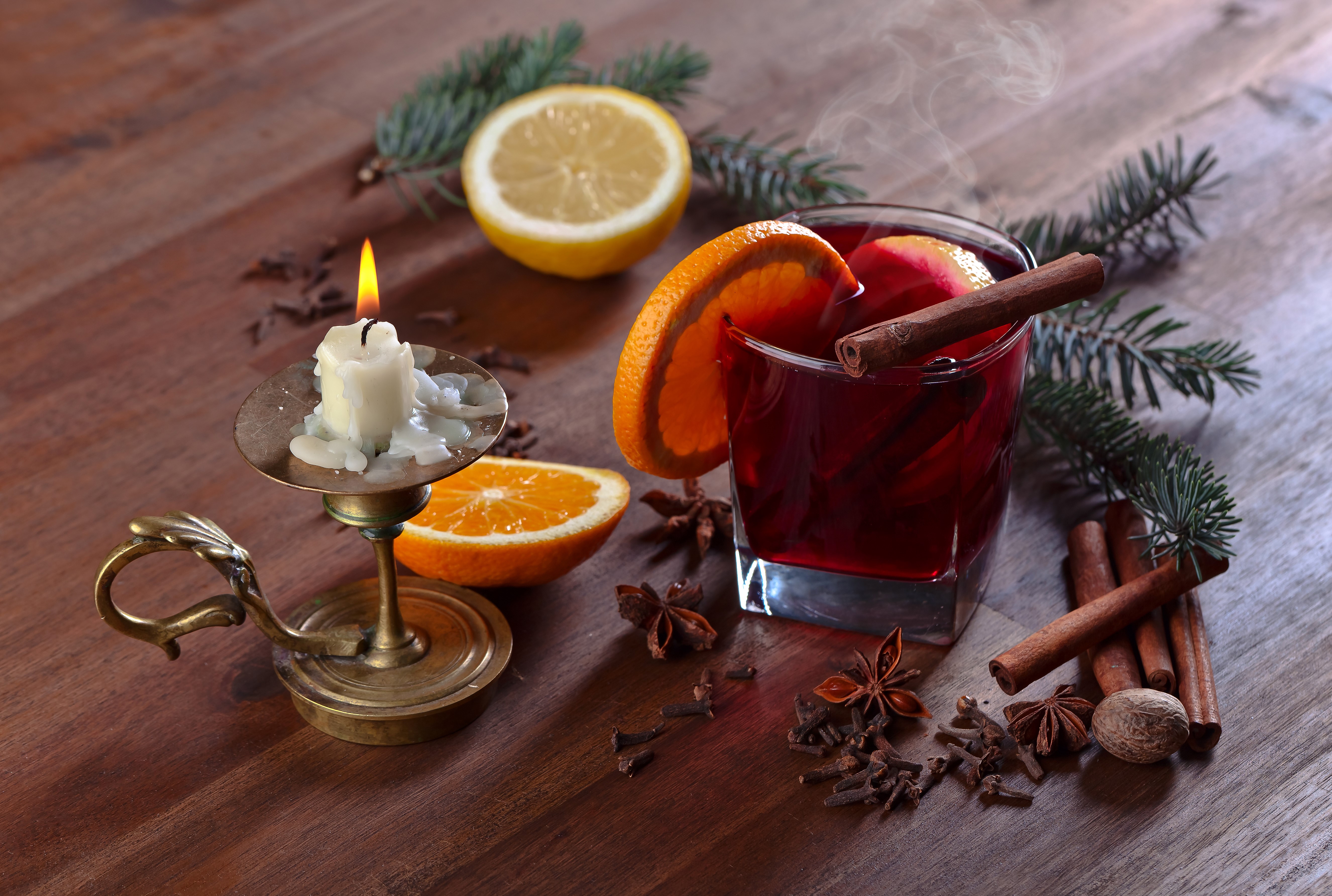 Mulled wine with orange, cinnamon, and candle HD Wallpaper