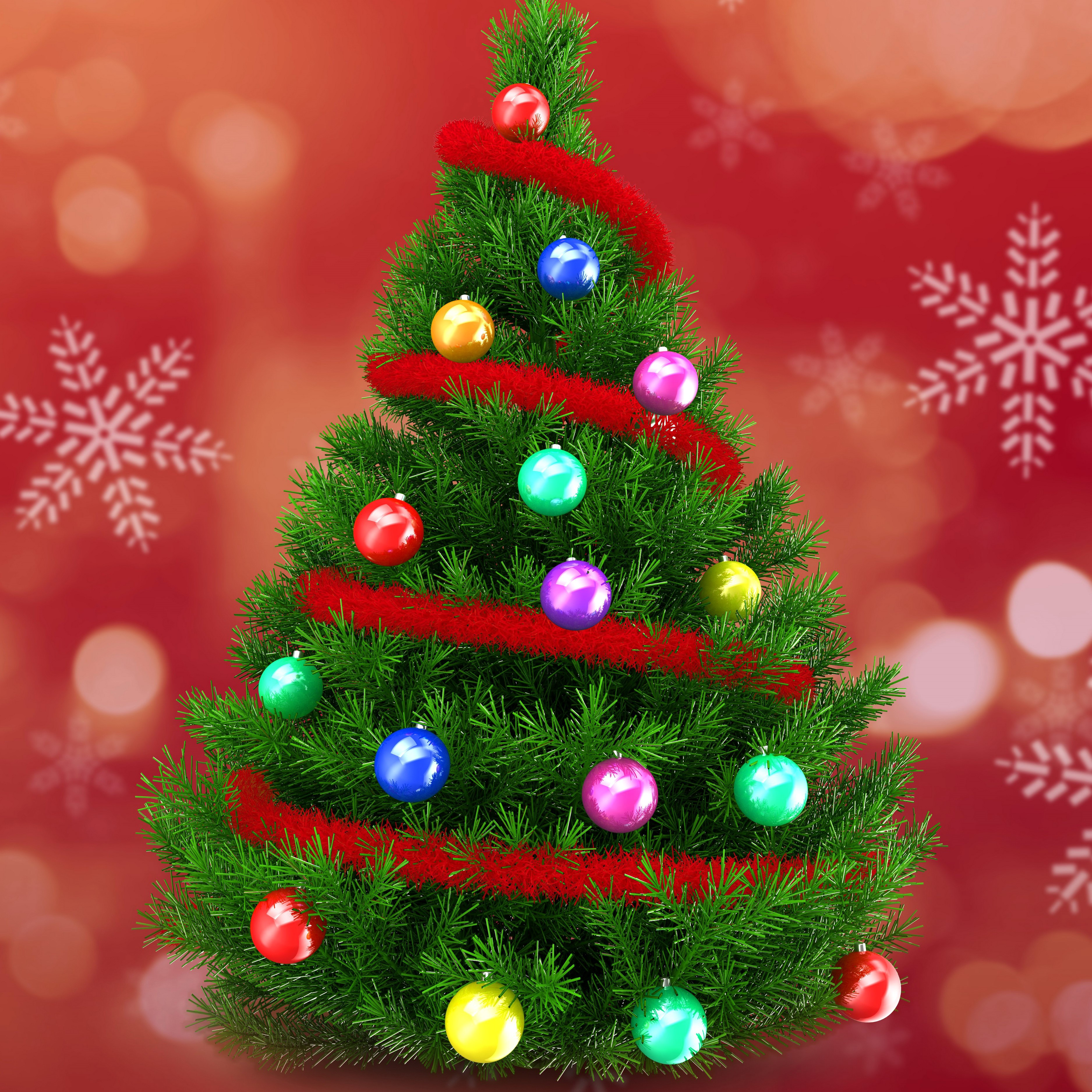 Christmas tree decorated with red tinsel and colorful balls HD Wallpaper