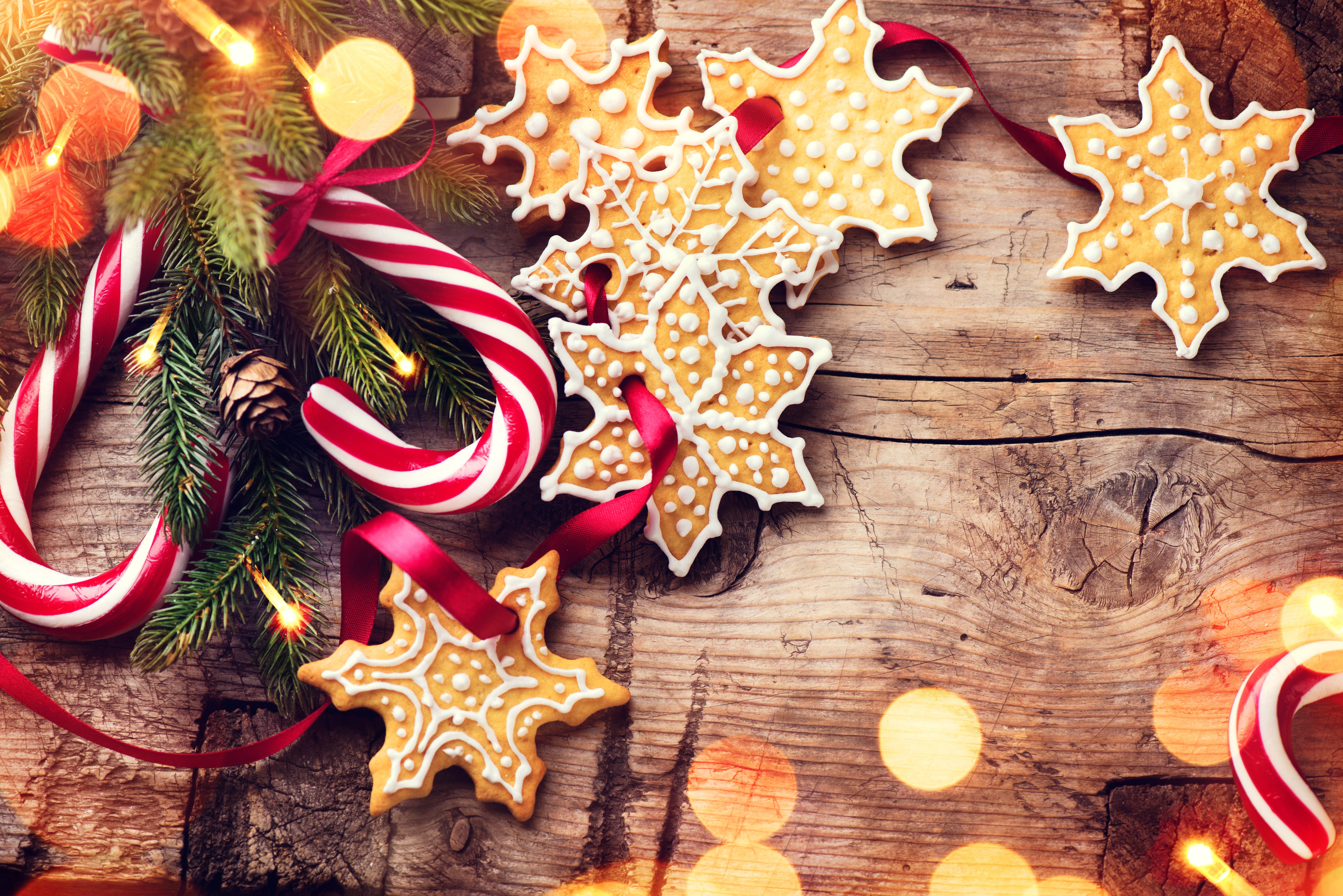Christmas cookies and candy canes on wood HD Wallpaper