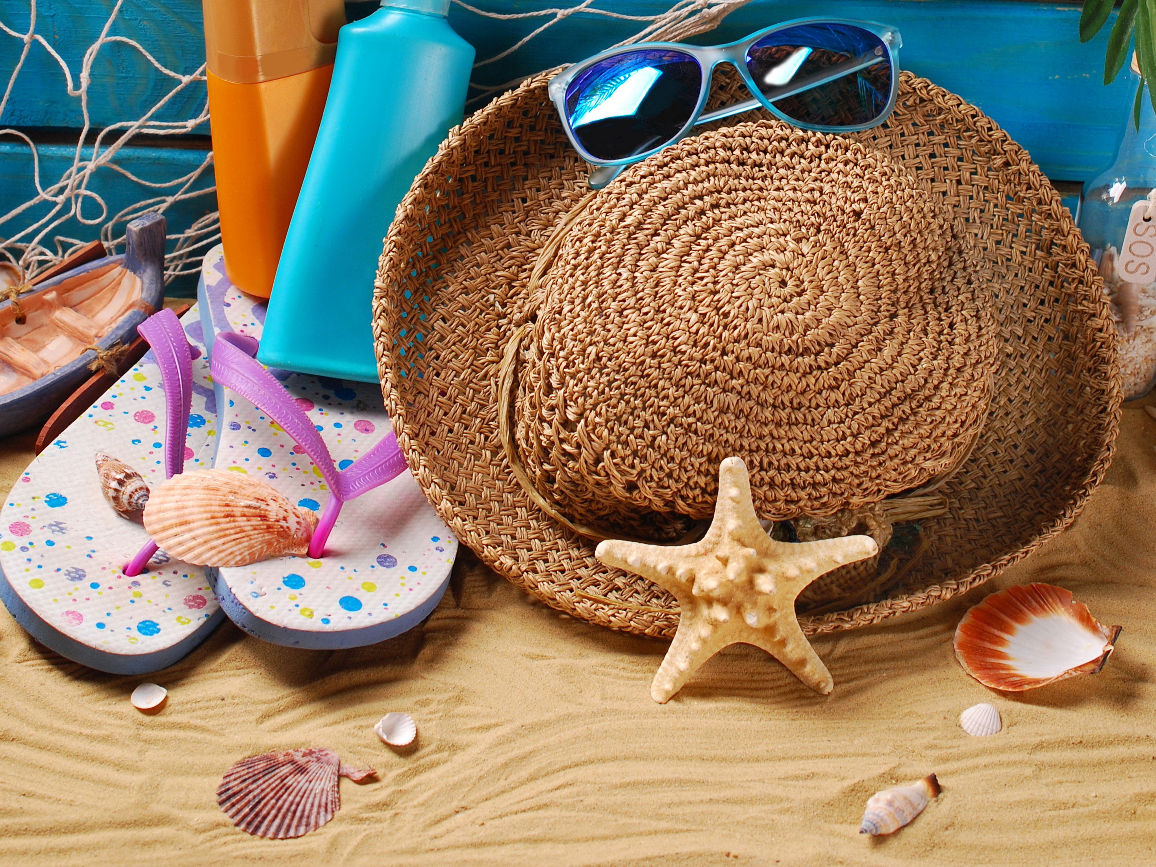 Summer Beach Essentials: Hat, Flip-flops, Sunscreen, and Seashells HD Wallpaper