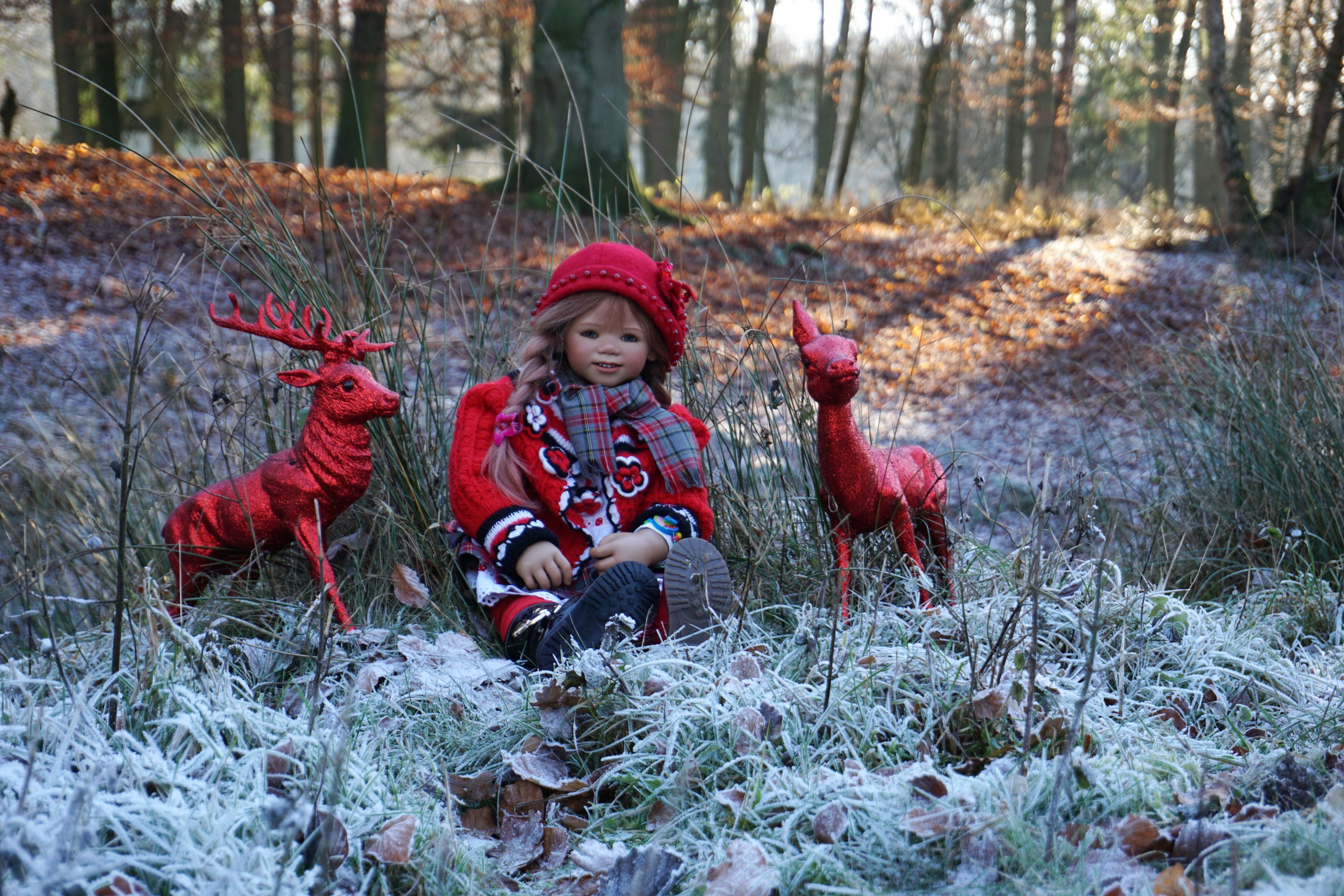 Doll with deer in a frosty forest HD Wallpaper