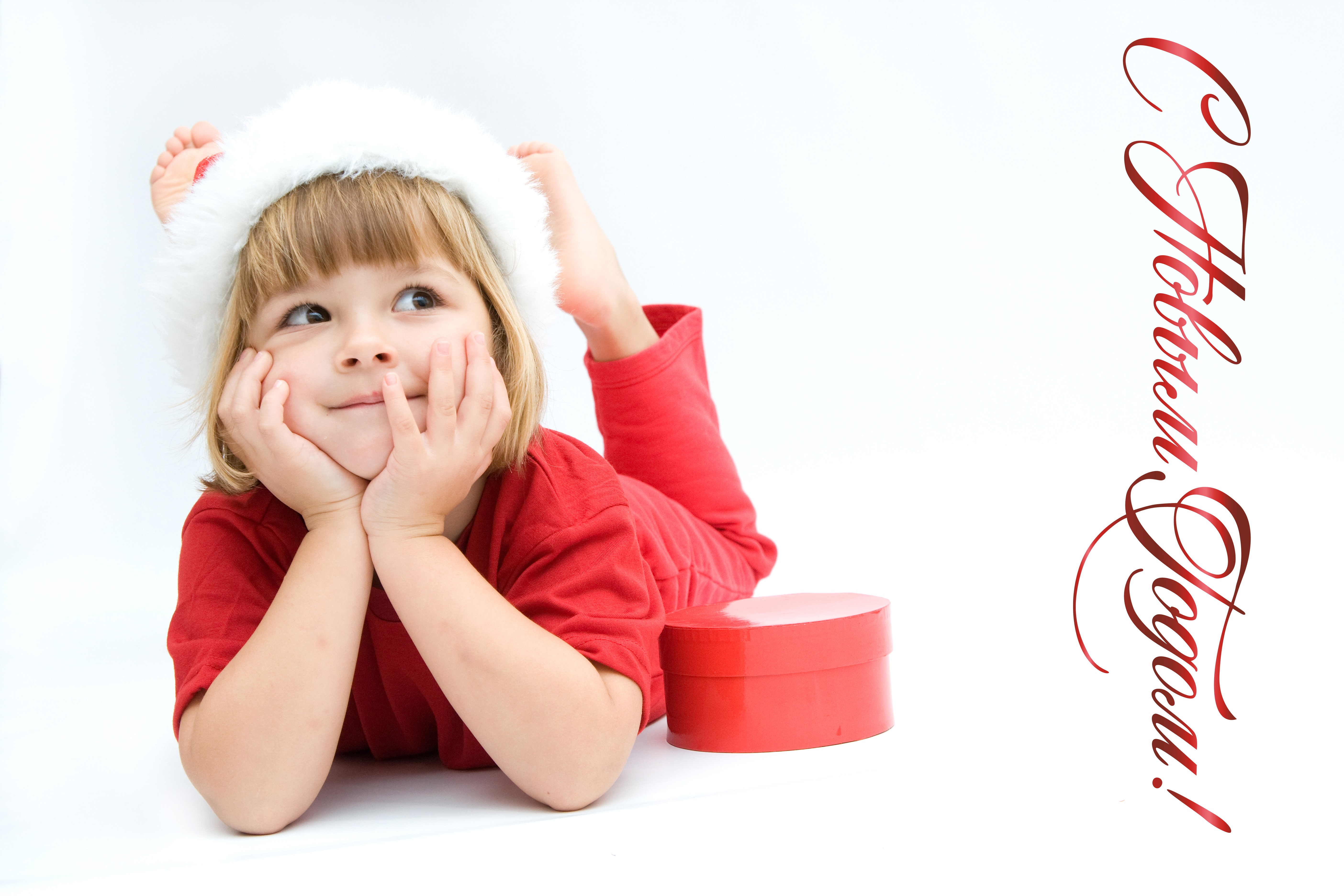 Girl in Santa hat with gift box and Russian text HD Wallpaper