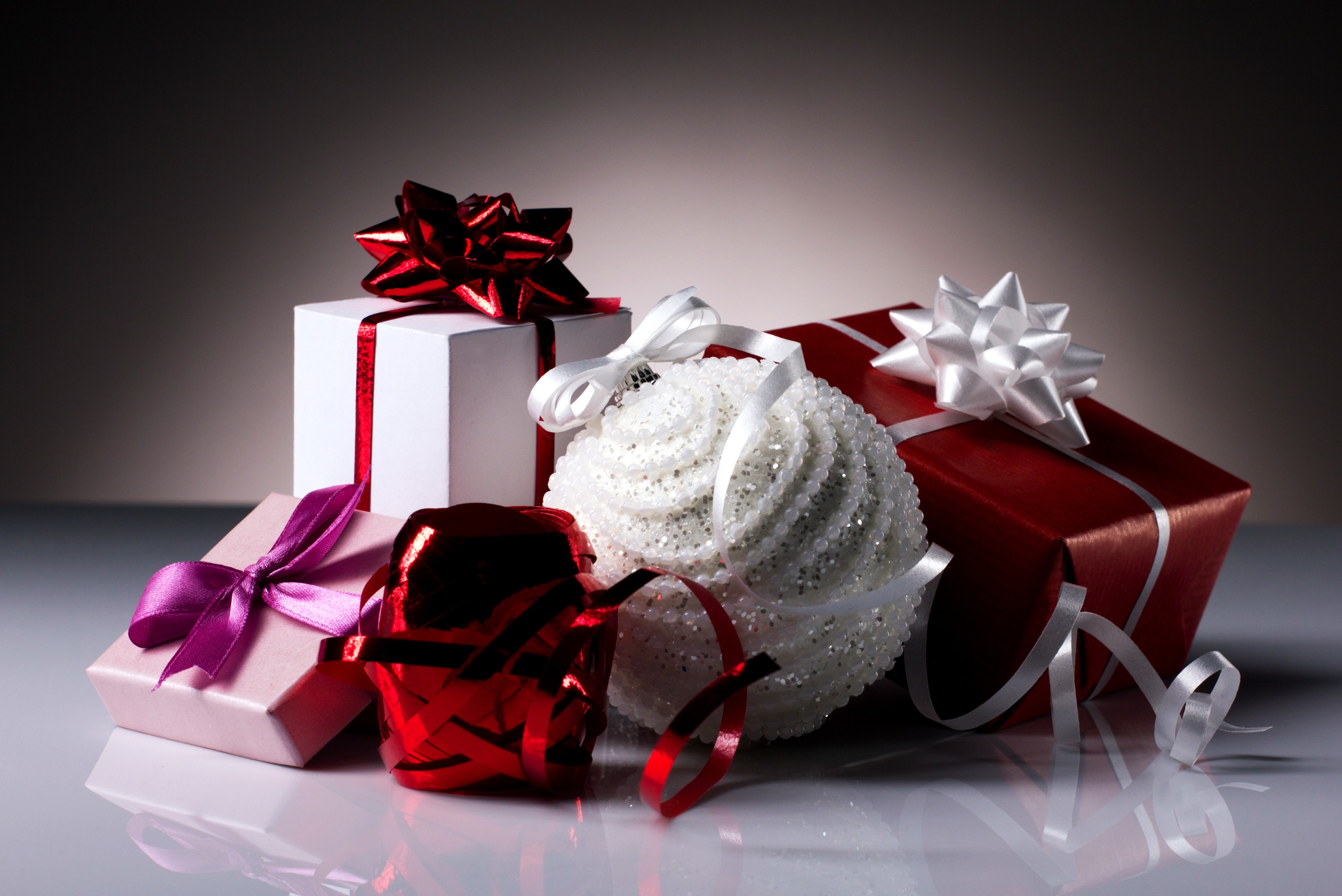 Christmas gifts and ornaments with reflections HD Wallpaper