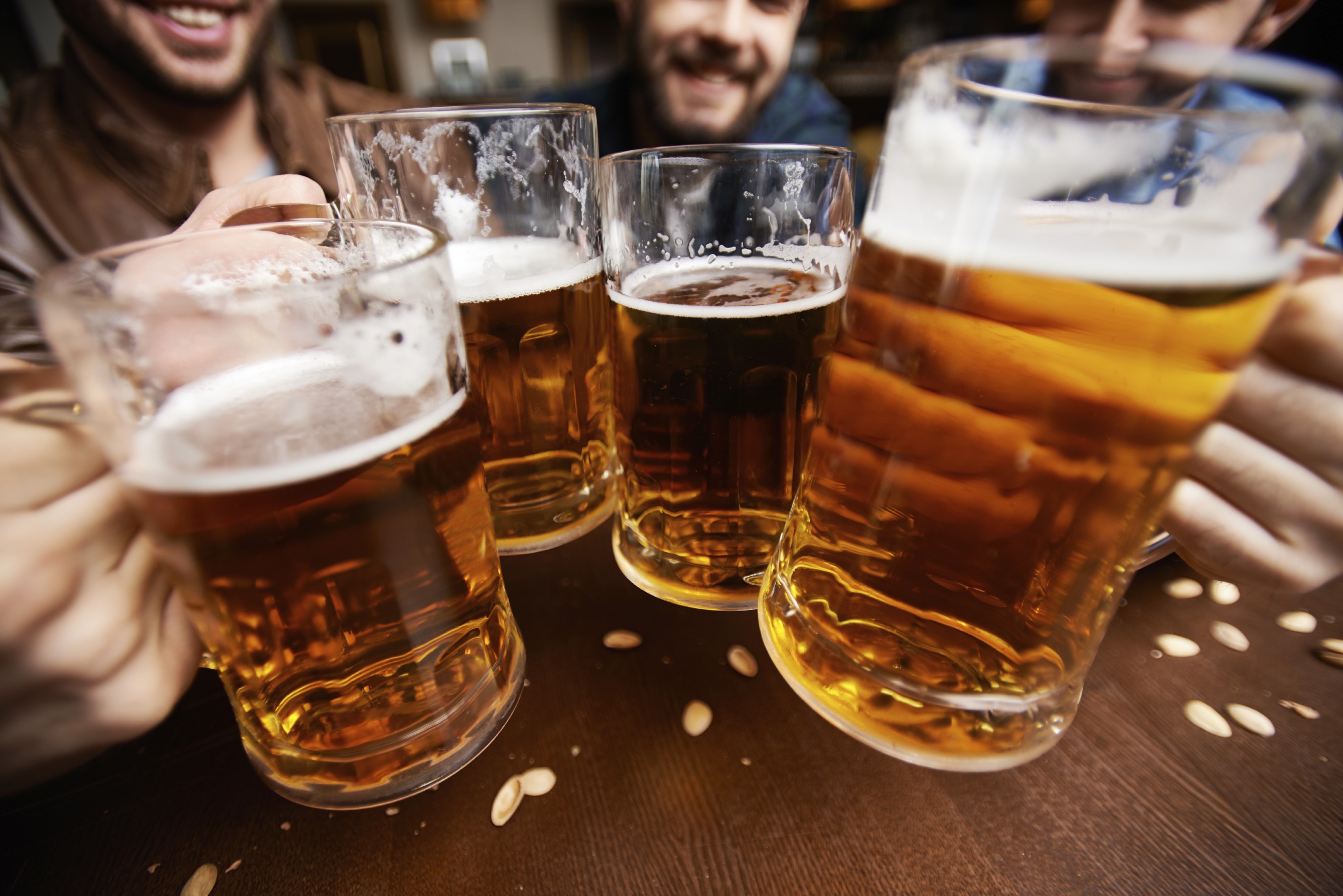 Friends toasting with beer mugs HD Wallpaper