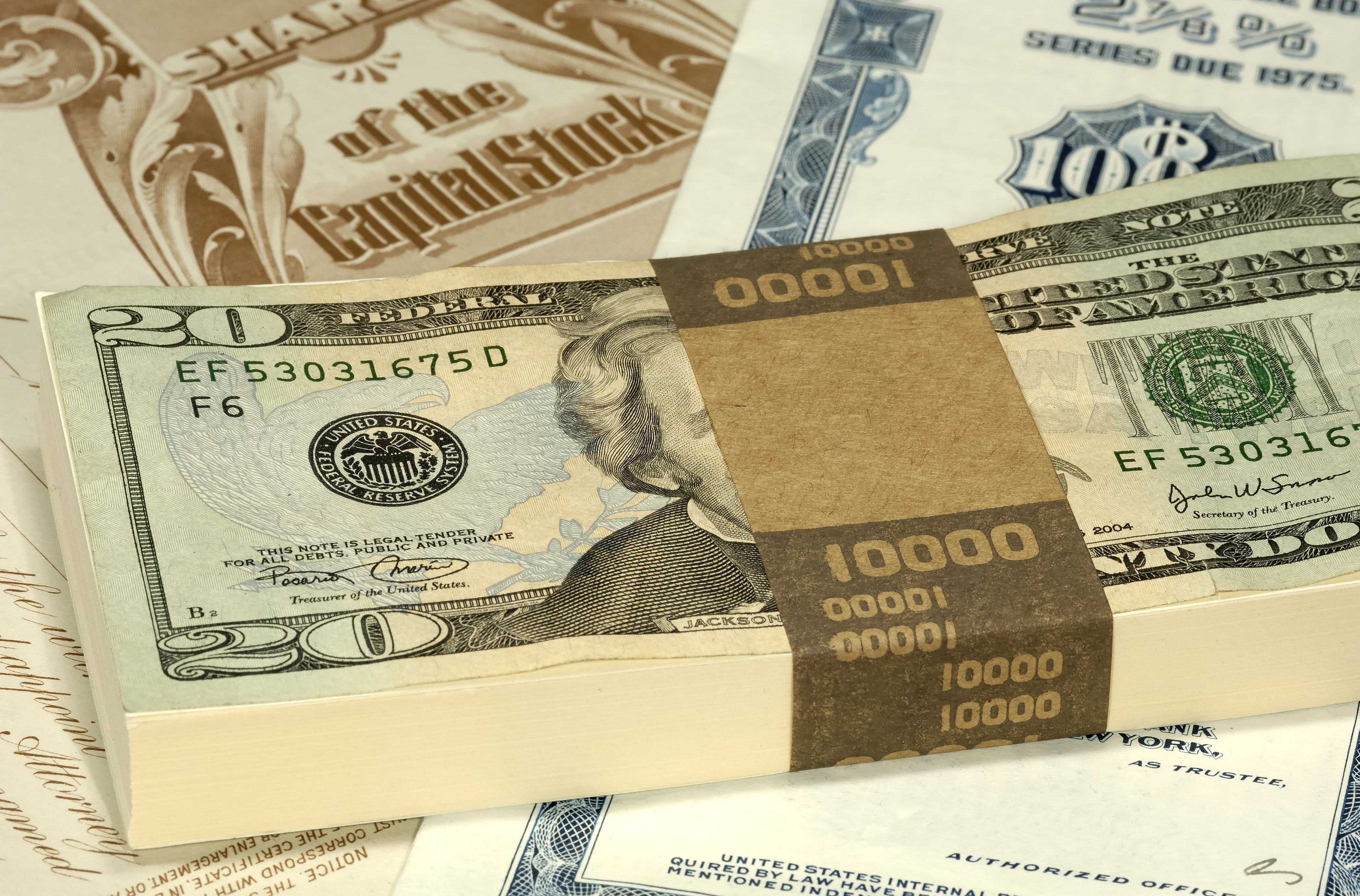 Stack of 20 Dollar Bills with Stock Certificates HD Wallpaper