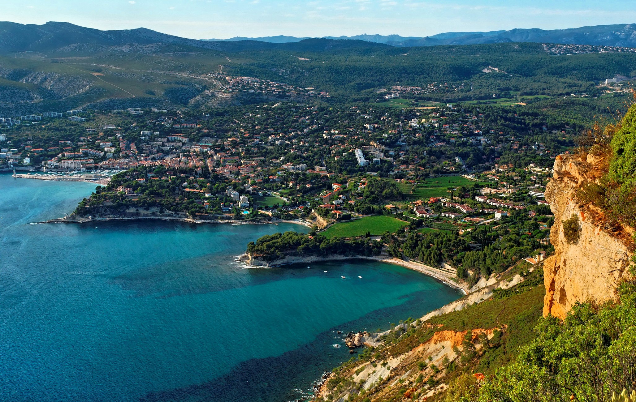 Aerial view of a coastal town and bay in Provence, France HD Wallpaper