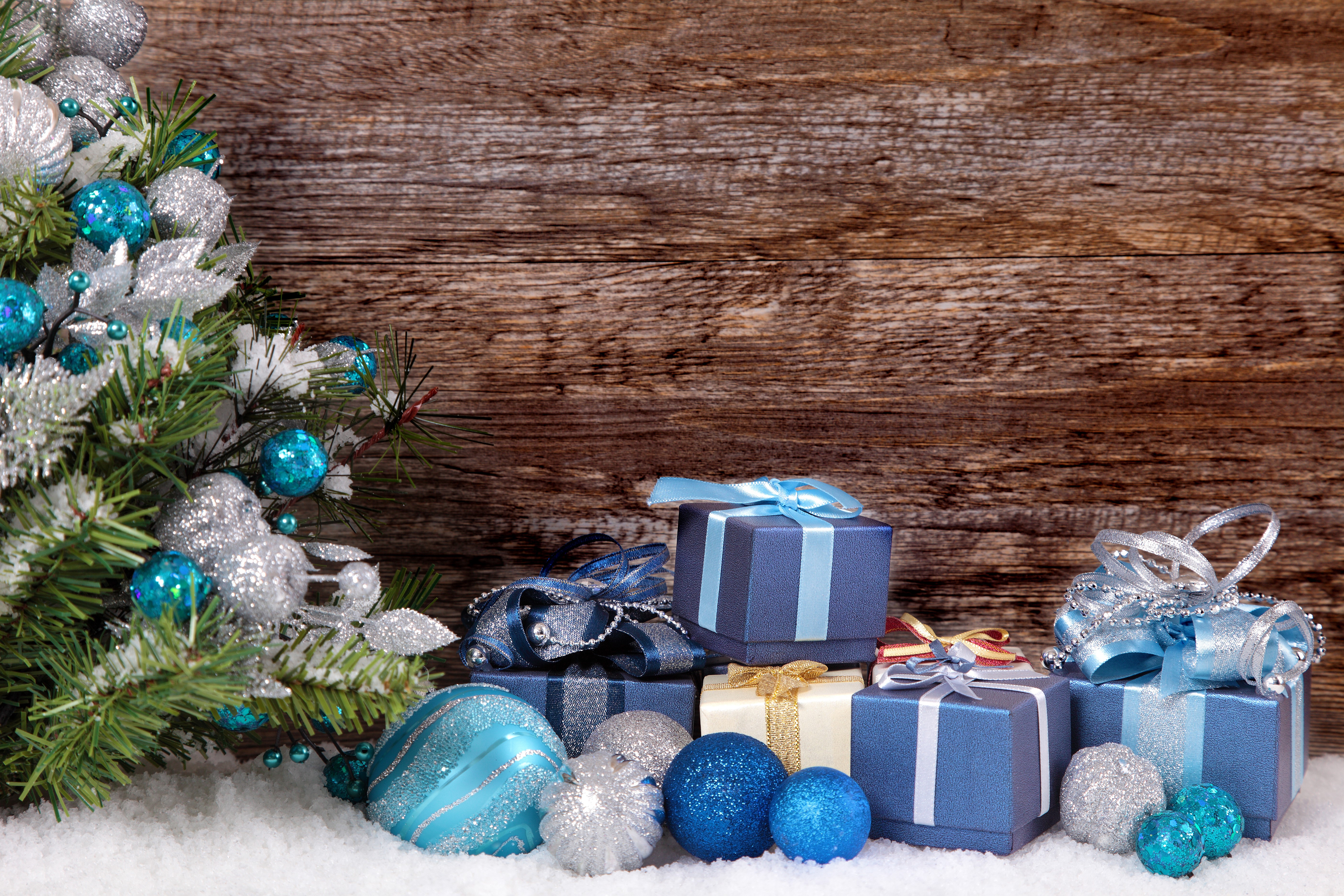 Christmas tree with ornaments and gifts on wood planks HD Wallpaper