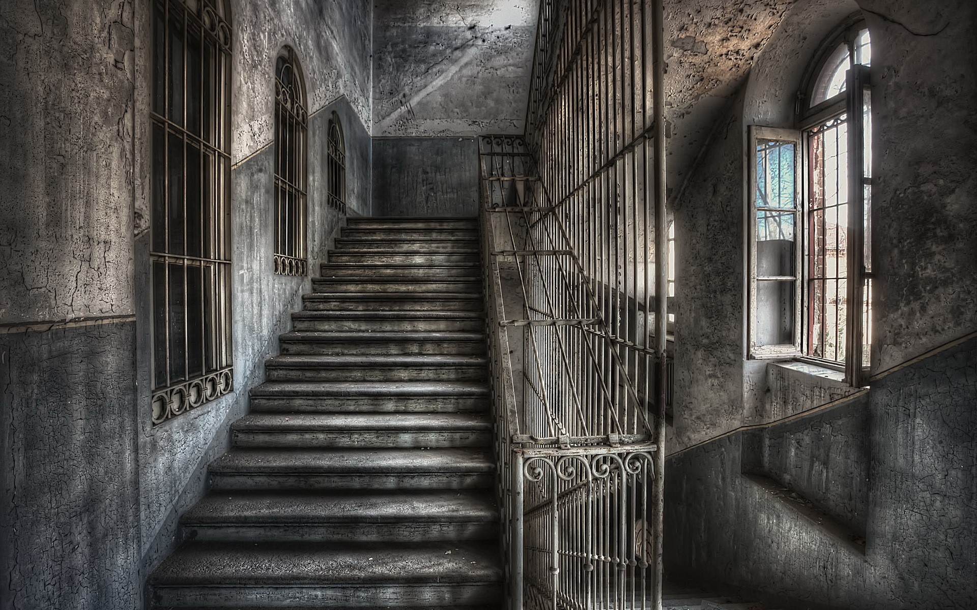 Abandoned building interior with stairs and windows HD Wallpaper