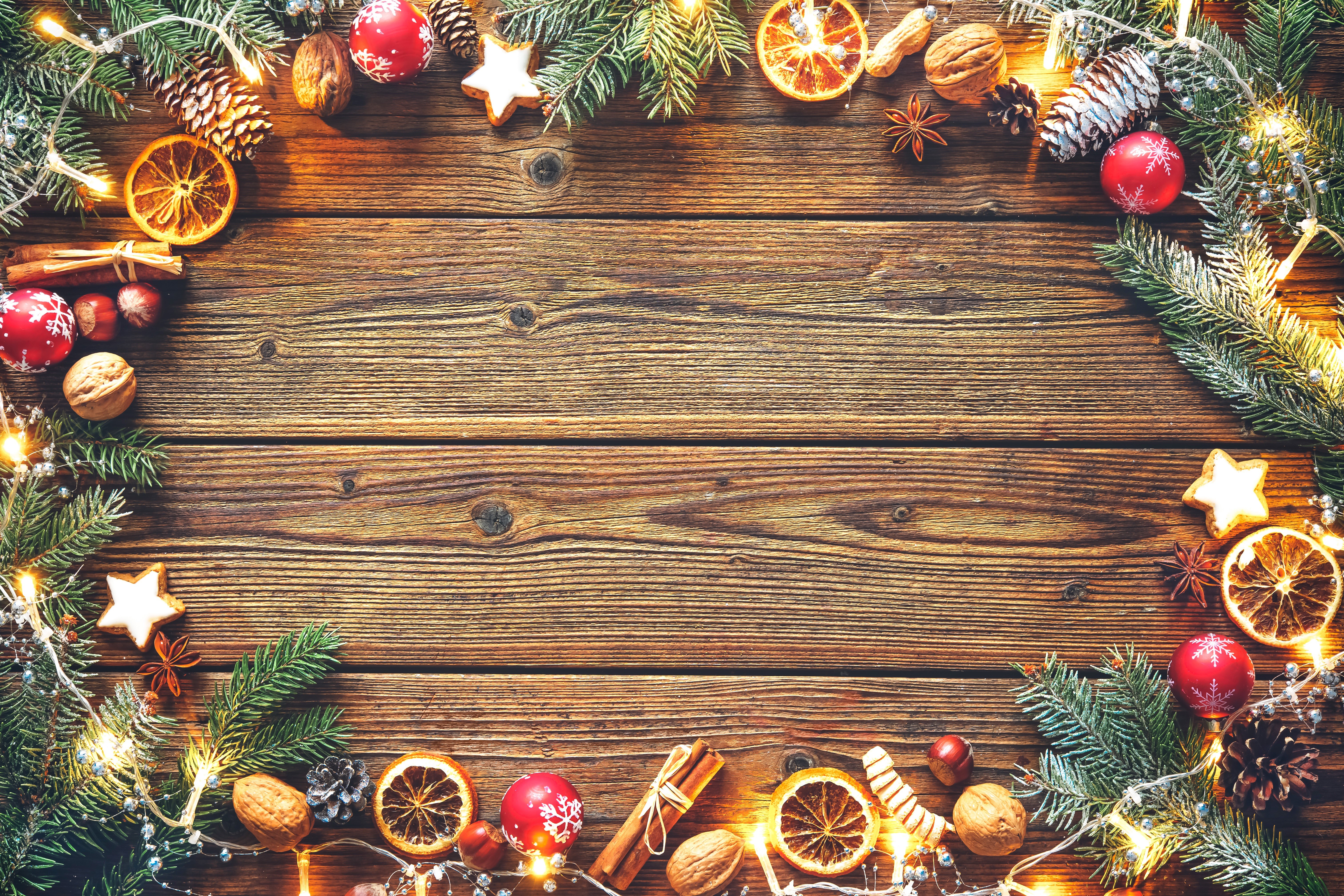 Christmas decorations on wooden planks with fairy lights HD Wallpaper