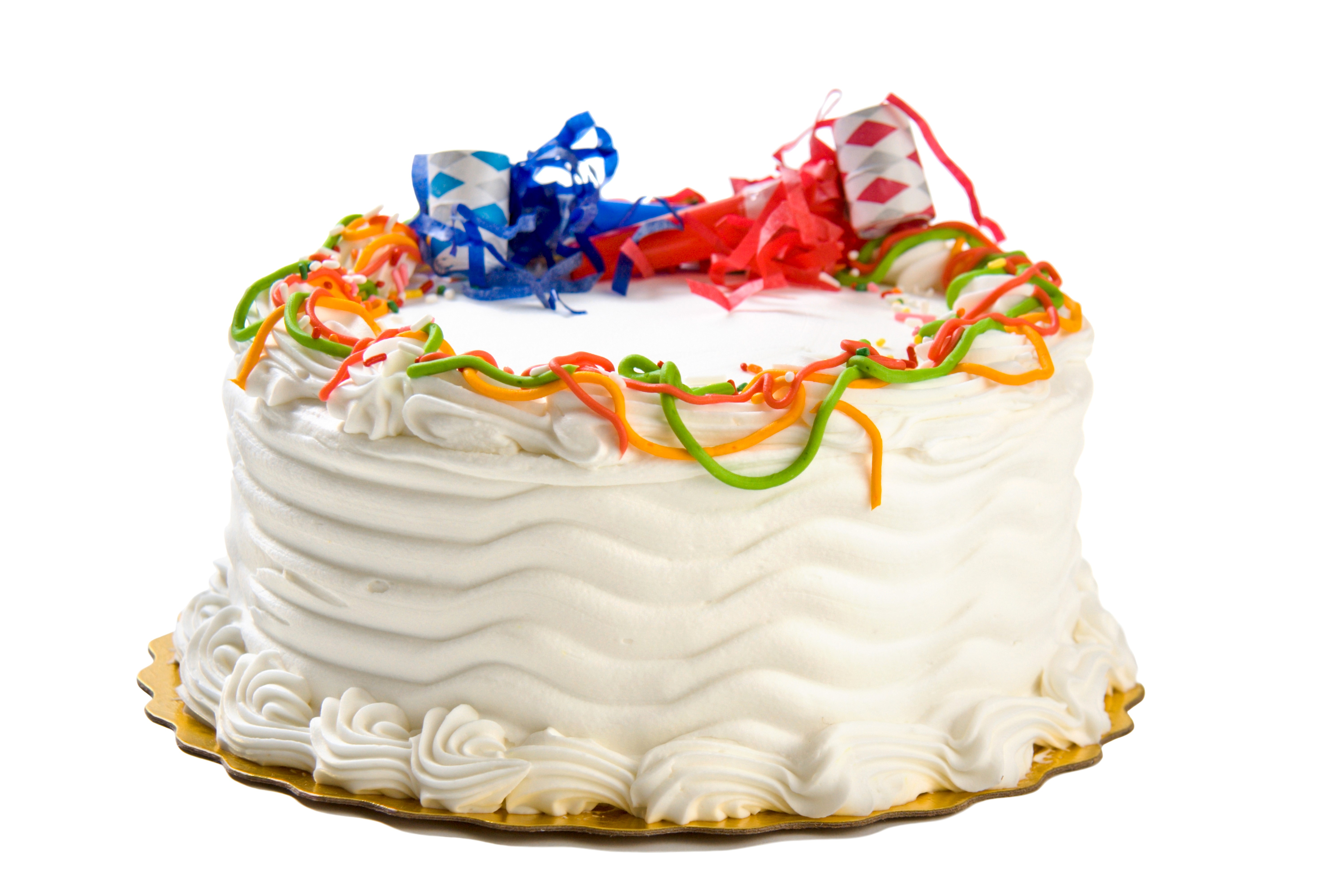 White cake with party streamers and decorations HD Wallpaper