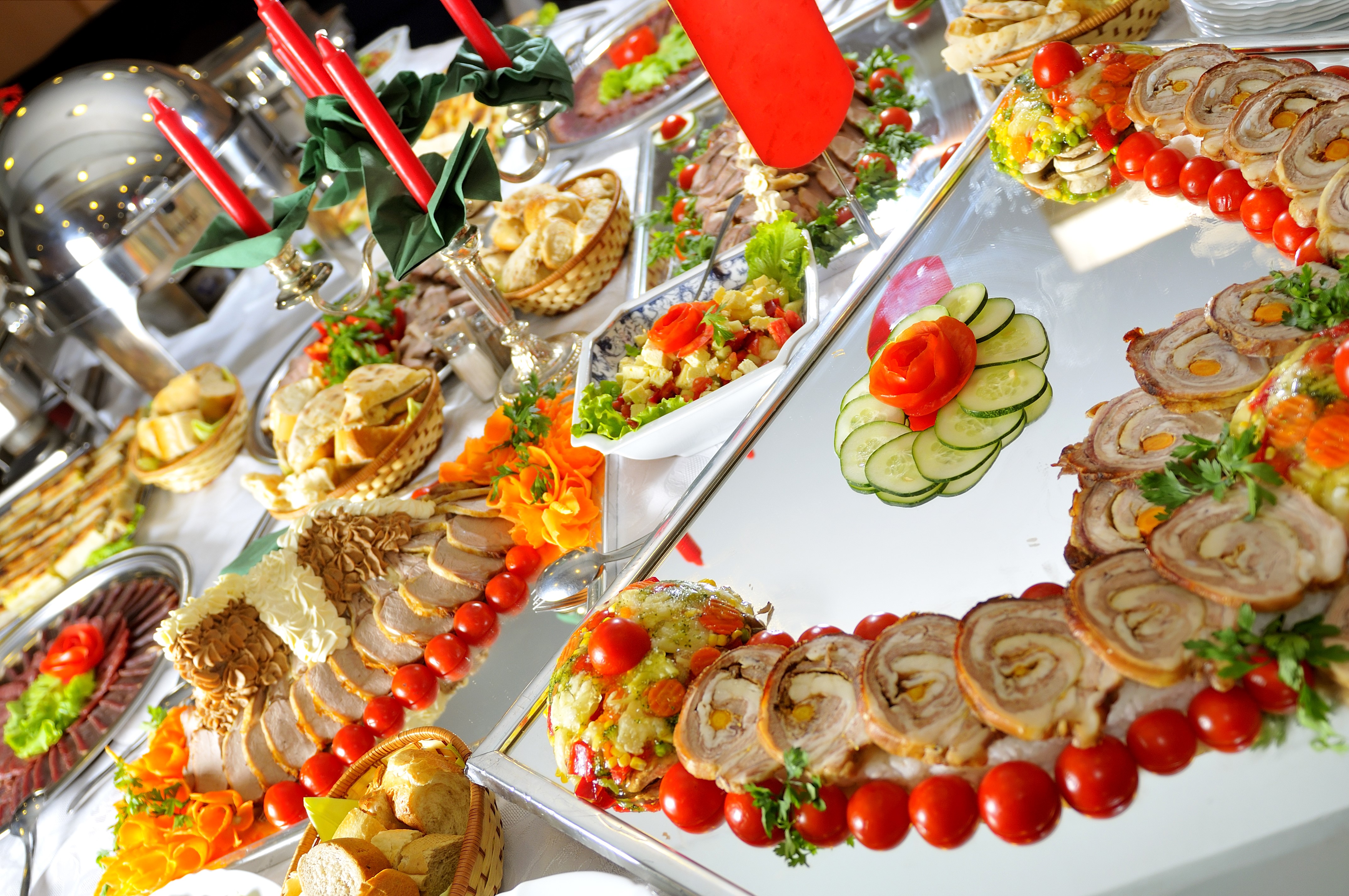 Buffet table with meat, salads, and bread HD Wallpaper