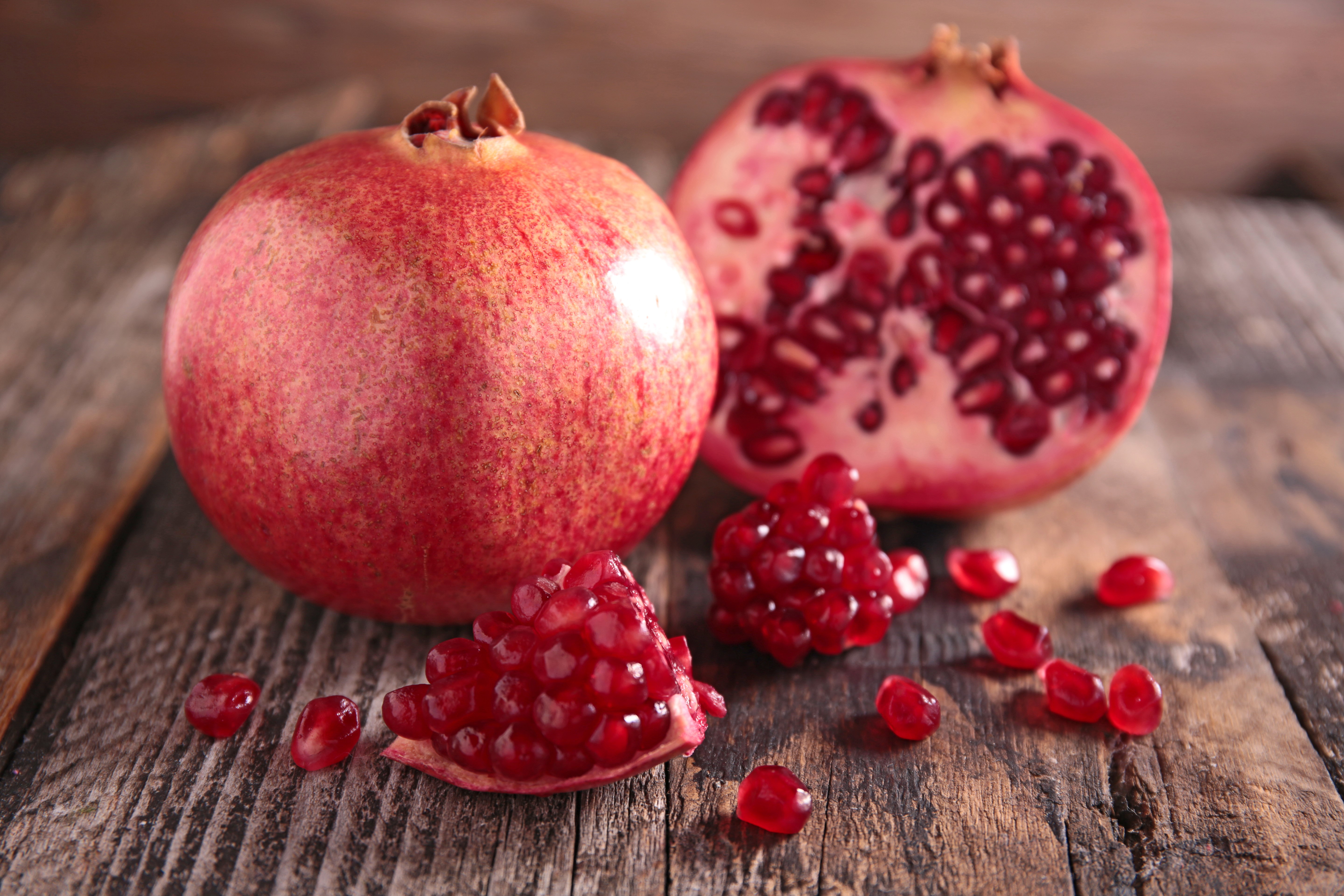 Pomegranates on Wood Planks HD Wallpaper