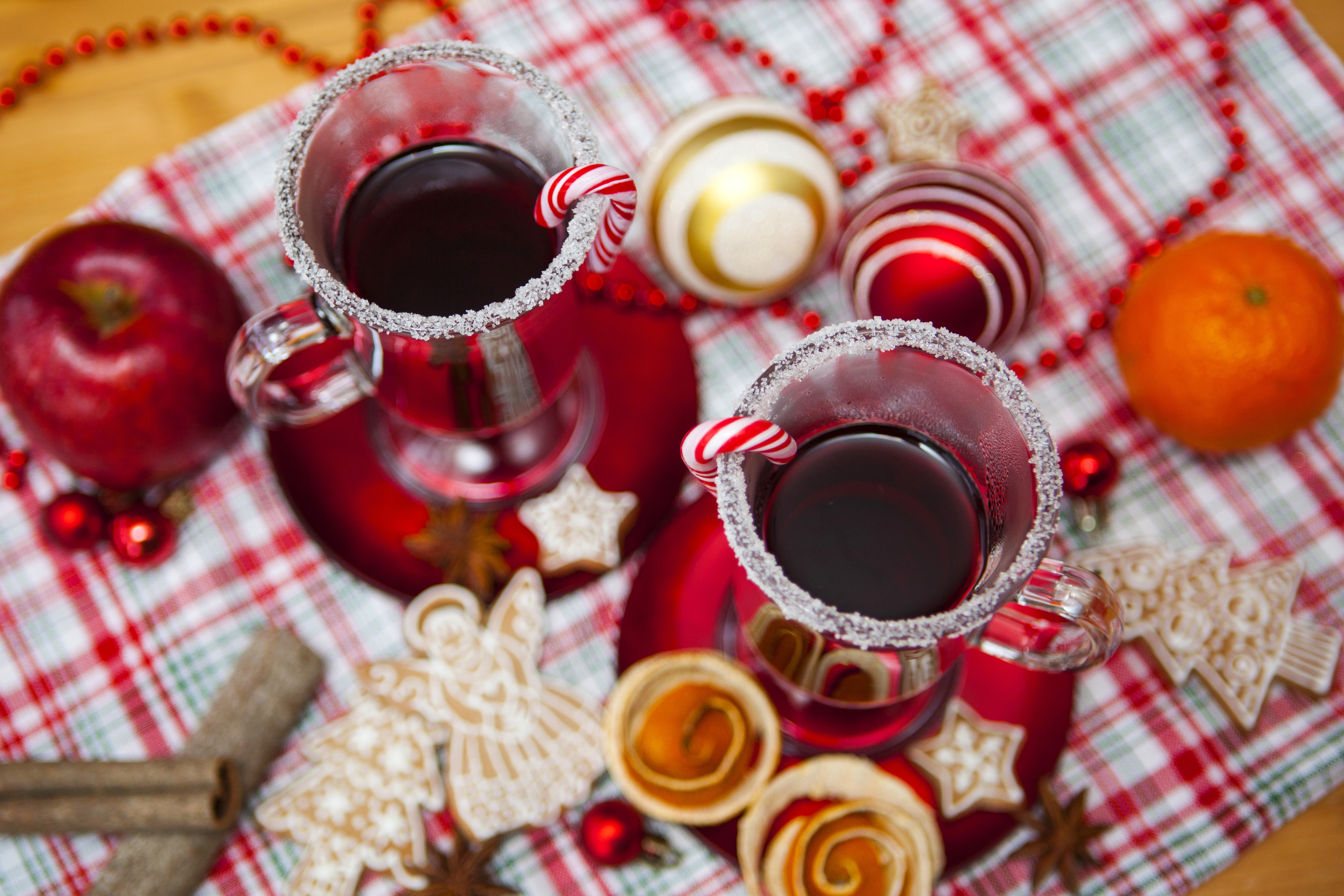 Christmas mulled wine with candy canes and cookies HD Wallpaper