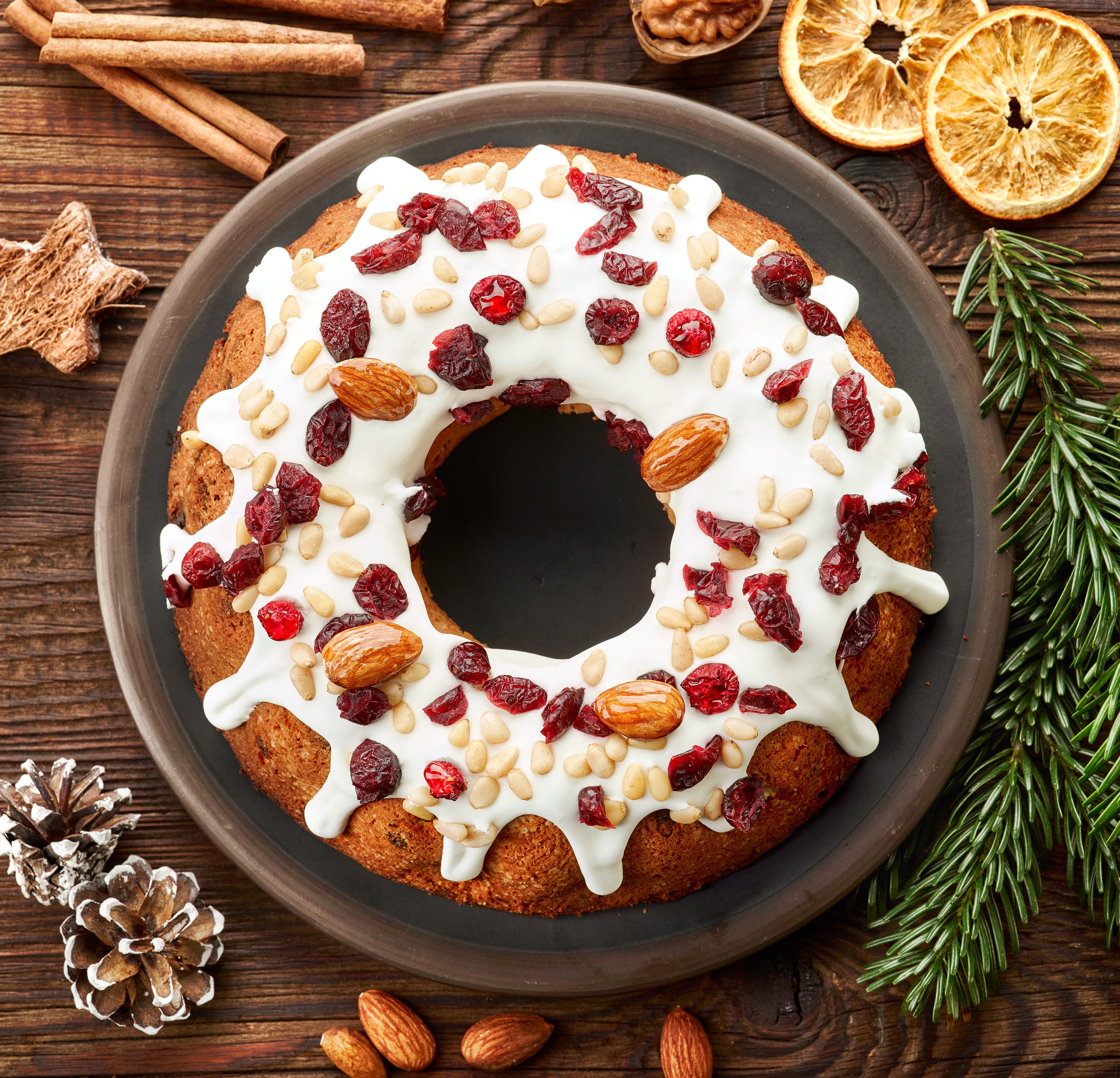 Christmas bundt cake with icing and nuts HD Wallpaper