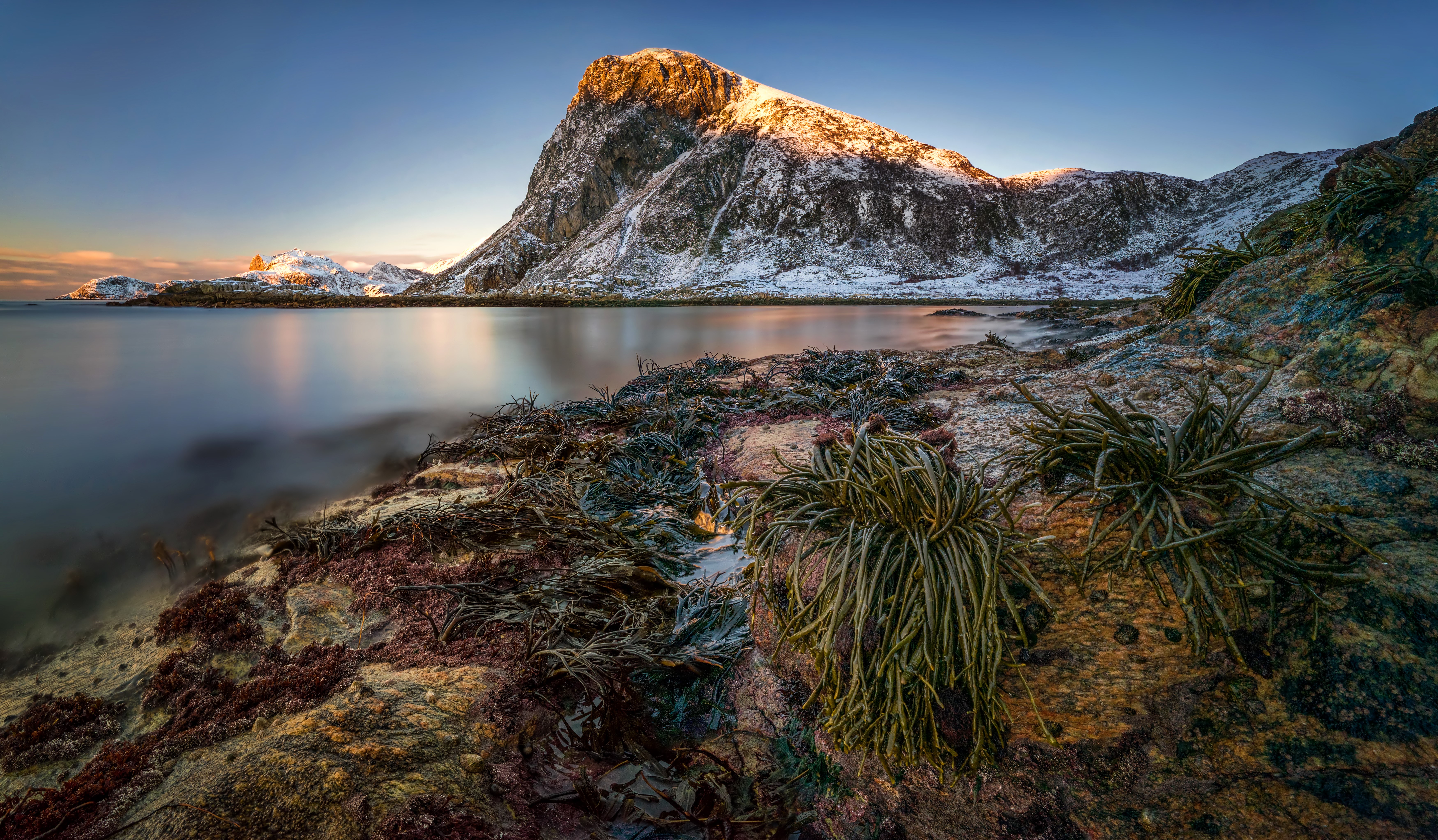 Snowy Mountains and Coastline in Lofoten, Norway HD Wallpaper